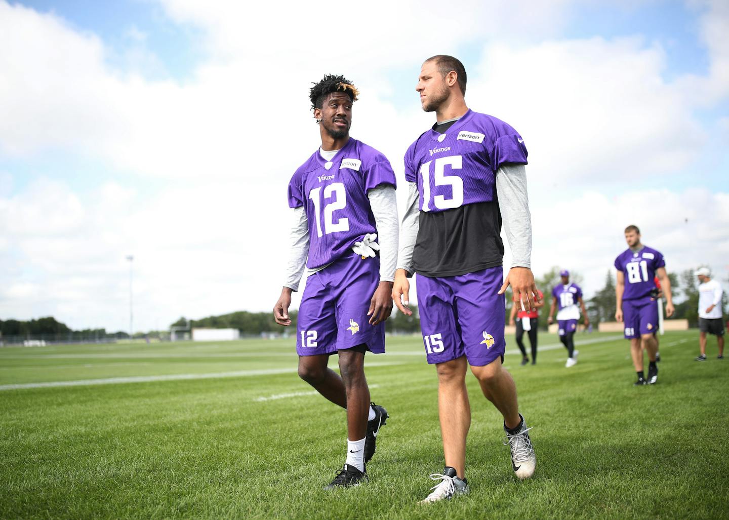 Vikings receivers Rodney Adams, left, and Issac Fruechte walked to the practice field Monday in Mankato. Adams is in the running to return kicks.