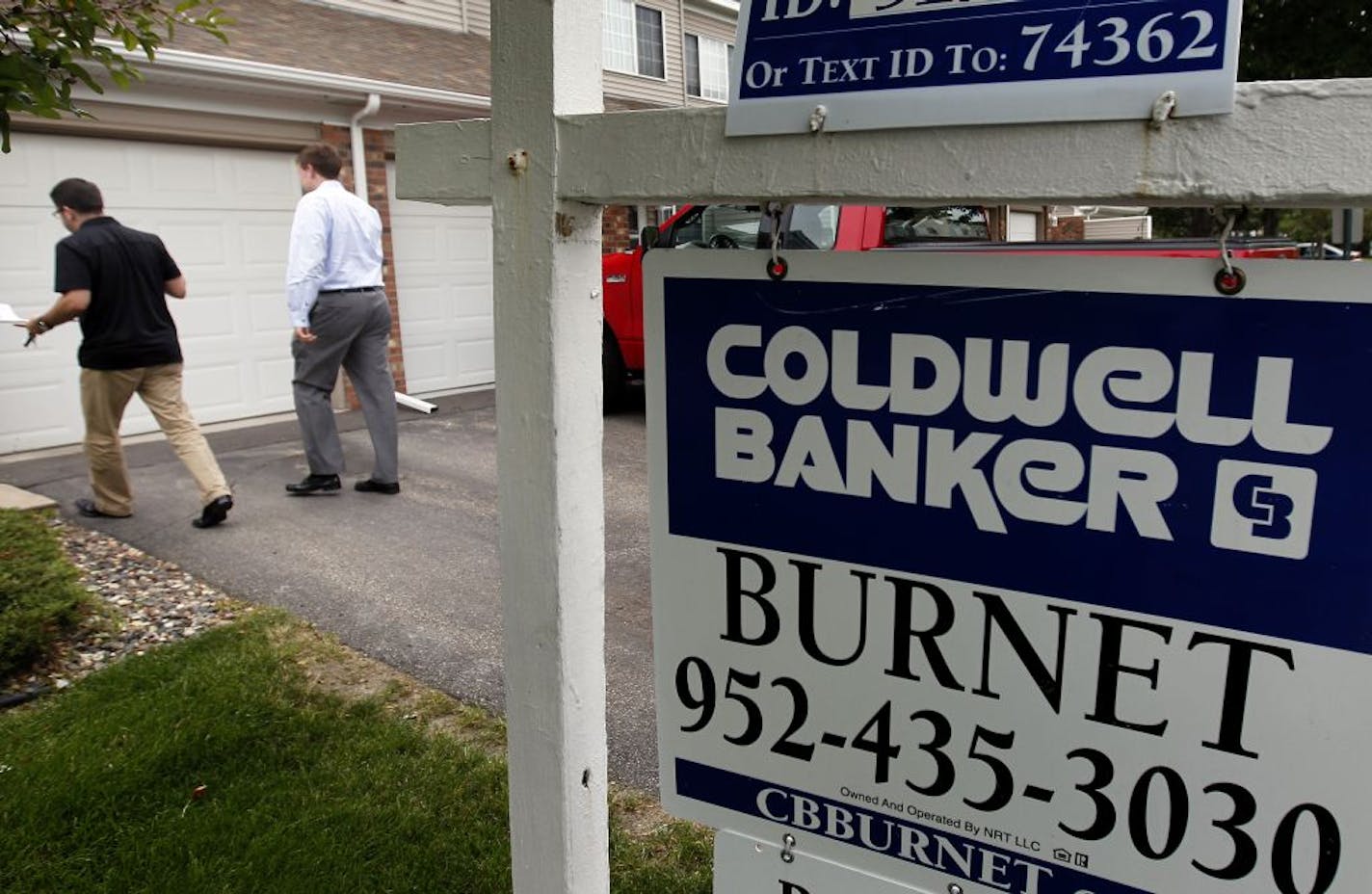 Realtor Steve Fiorella led Heath Stoll, 24, of Apple Valley to view a Townhome in Bloomington, Minn.