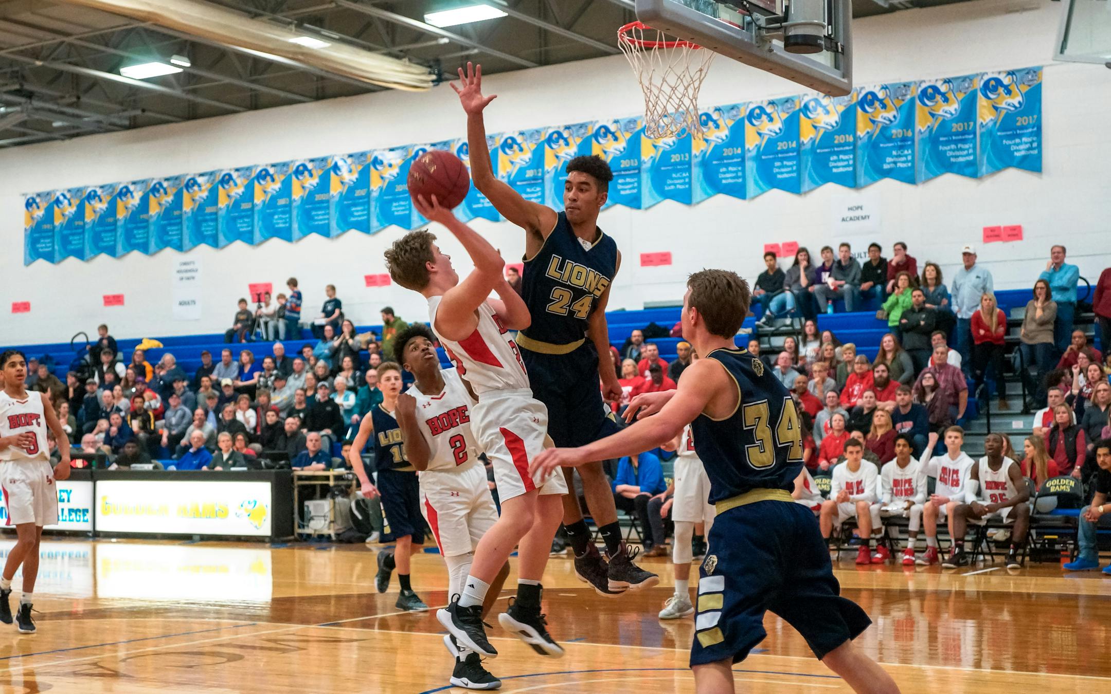 McCaleb Alleman (24, right, CHOF senior forward, defends against Hope Academy. Preston Alleman (34) looks on. Class 1A, Section 4 Hope Academy vs. CHOF 3/15/19 Photo by Korey McDermott, SportsEngine