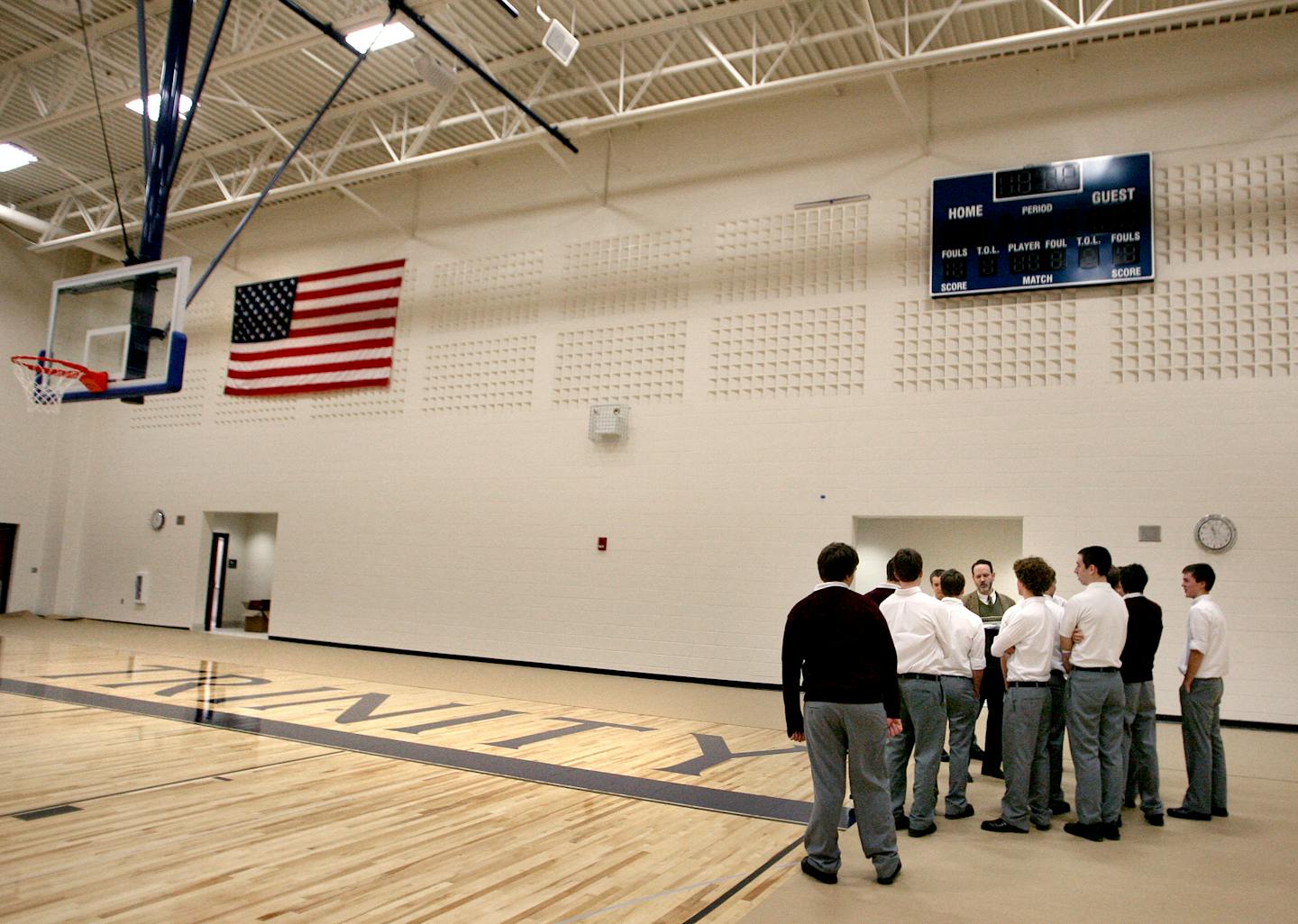 Scott Pentacost showed juniors around the school. The school moved from its original location in Bloomington to a new one in Eagan. It now has athletic areas and is wireless-friendly.