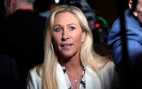 FILE - Rep. Marjorie Taylor Greene, R-Ga., arrives for an interview in Laconia, N.H., Jan. 22, 2024. Social media accounts who shield their real ident