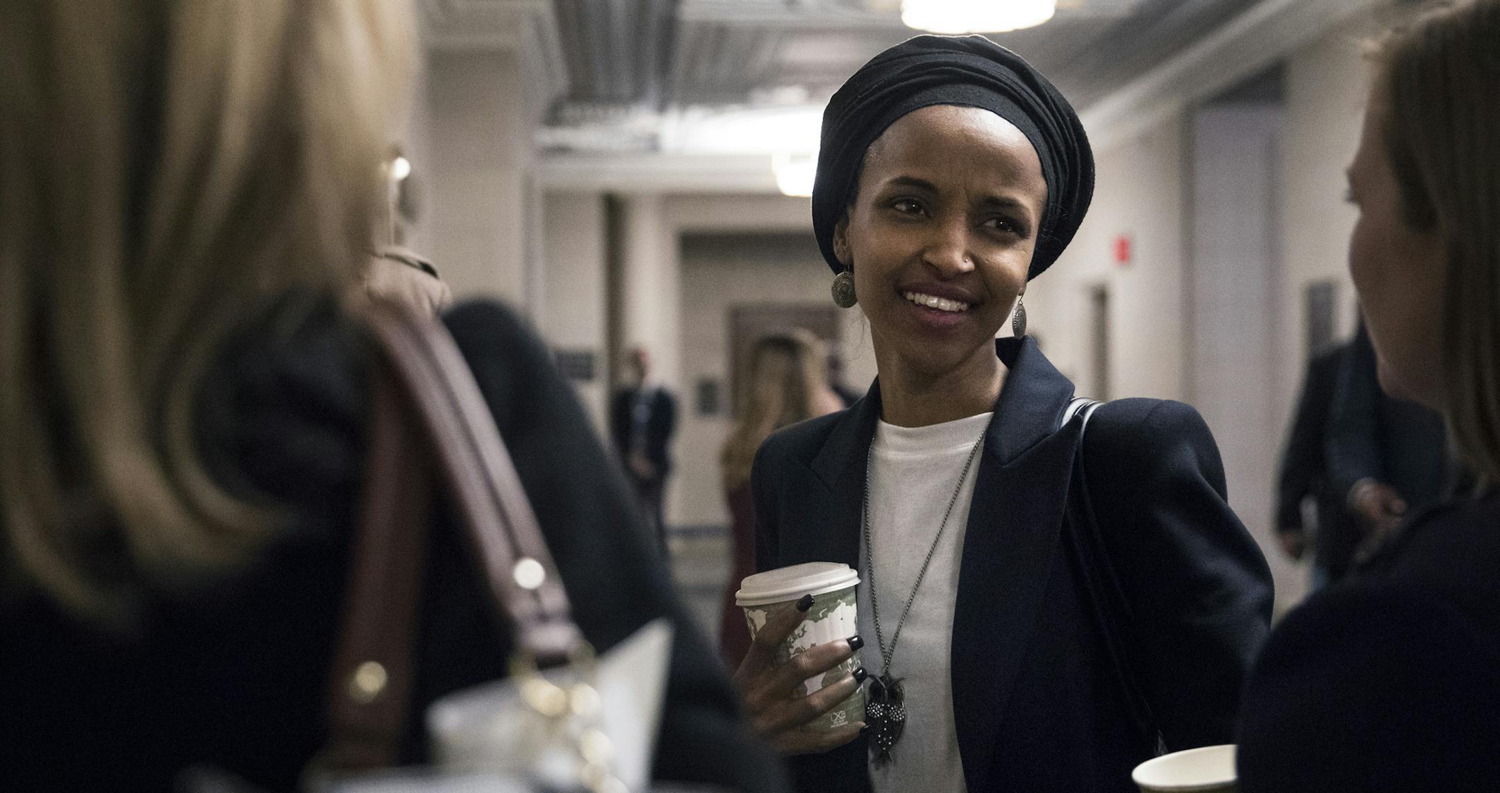 Representative-elect Ilhan Omar (D-Minn.) on Capitol Hill, in Washington, Nov. 28, 2018. House Democrats nominated House Minority Leader Nancy Pelosi (D-Calif.) on Wednesday to be the speaker in the new Democratic House majority, but with 32 Democrats voting no, she was well short of the number she will need to be elected speaker in January. (Sarah Silbiger/The New York Times)