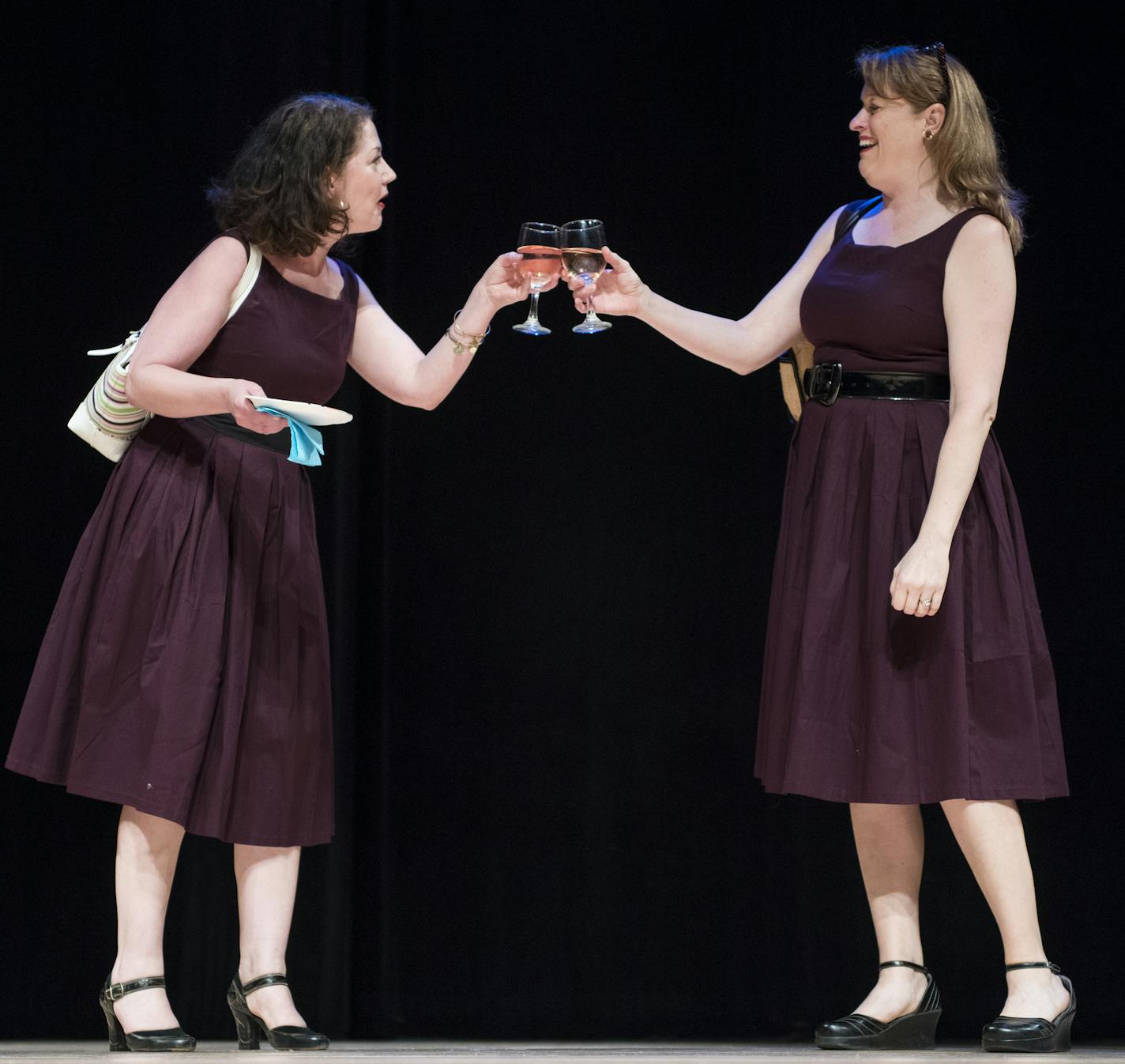 Carolyn Pool, left, and Shanan Custer previewed a scene from "Sometimes There's Wine" at the Rarig Center on Monday night. ] Isaac Hale &#xef; isaac.hale@startribune.com Theatre groups took the stage at the Rarig Center in Minneapolis, MN, on Monday, July 25, 2016, and previewed 3-minute acts the stage productions they'll be performing at the upcoming Fringe Festival. Approximately 30 groups took their turns showcasing productions with a variety of formats, topics and genres.