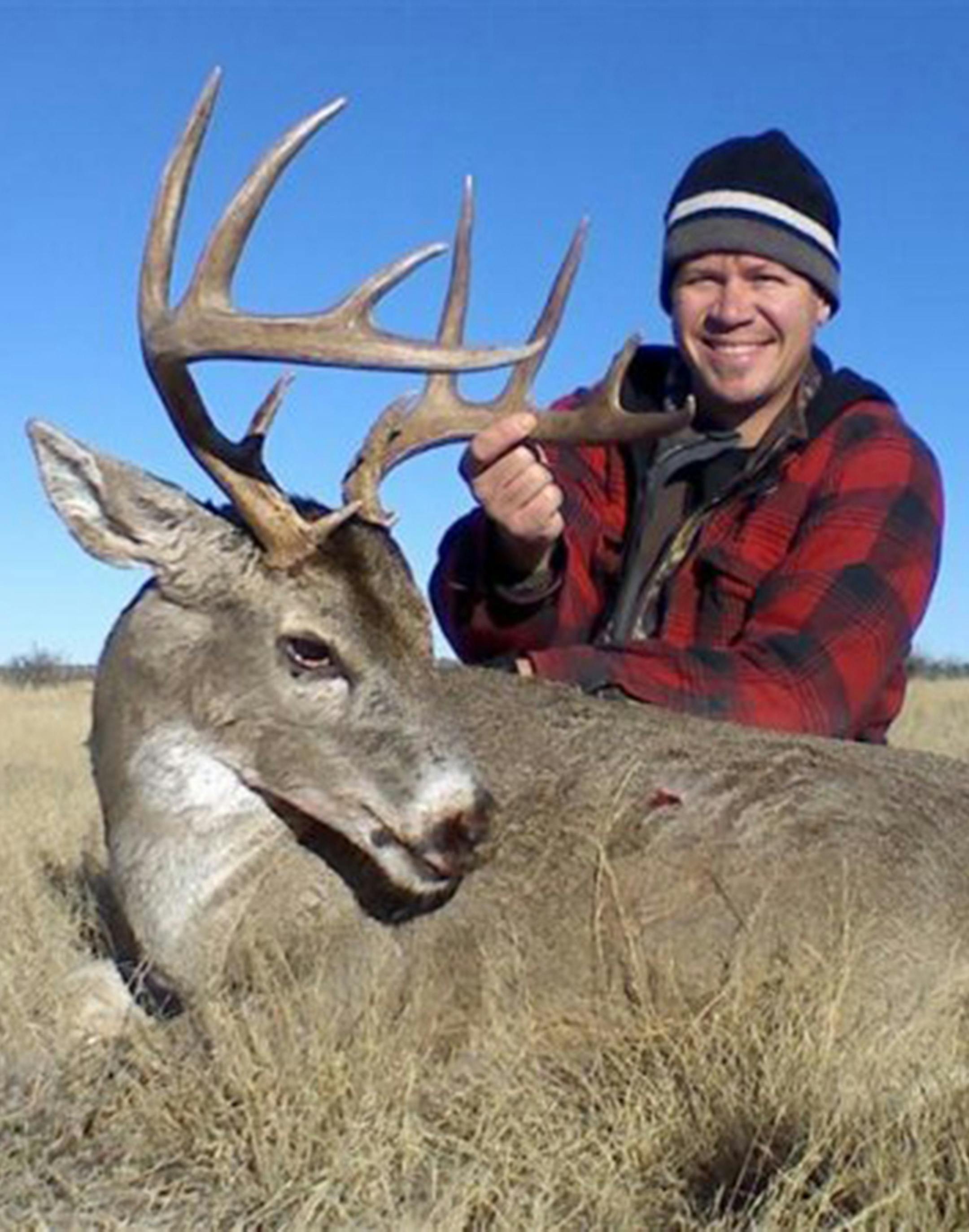 Brooks Johnson of Monticello, president of Minnesota Bowhunters Inc., with a big buck he shot in Texas. Photo courtsey Brooks Johnson. ORG XMIT: MIN1401131754231764