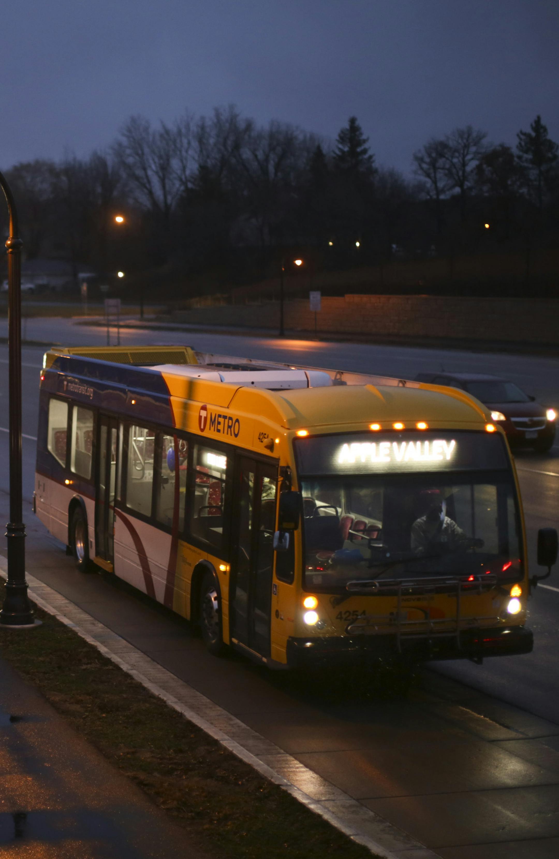 A southbound Red Line bus pulled into the stop at 140th St. in Apple Valley Tuesday evening. ] JEFF WHEELER • jeff.wheeler@startribune.com The Red Line stop near 140th St. in Apple Valley Tuesday evening, December 23, 2014