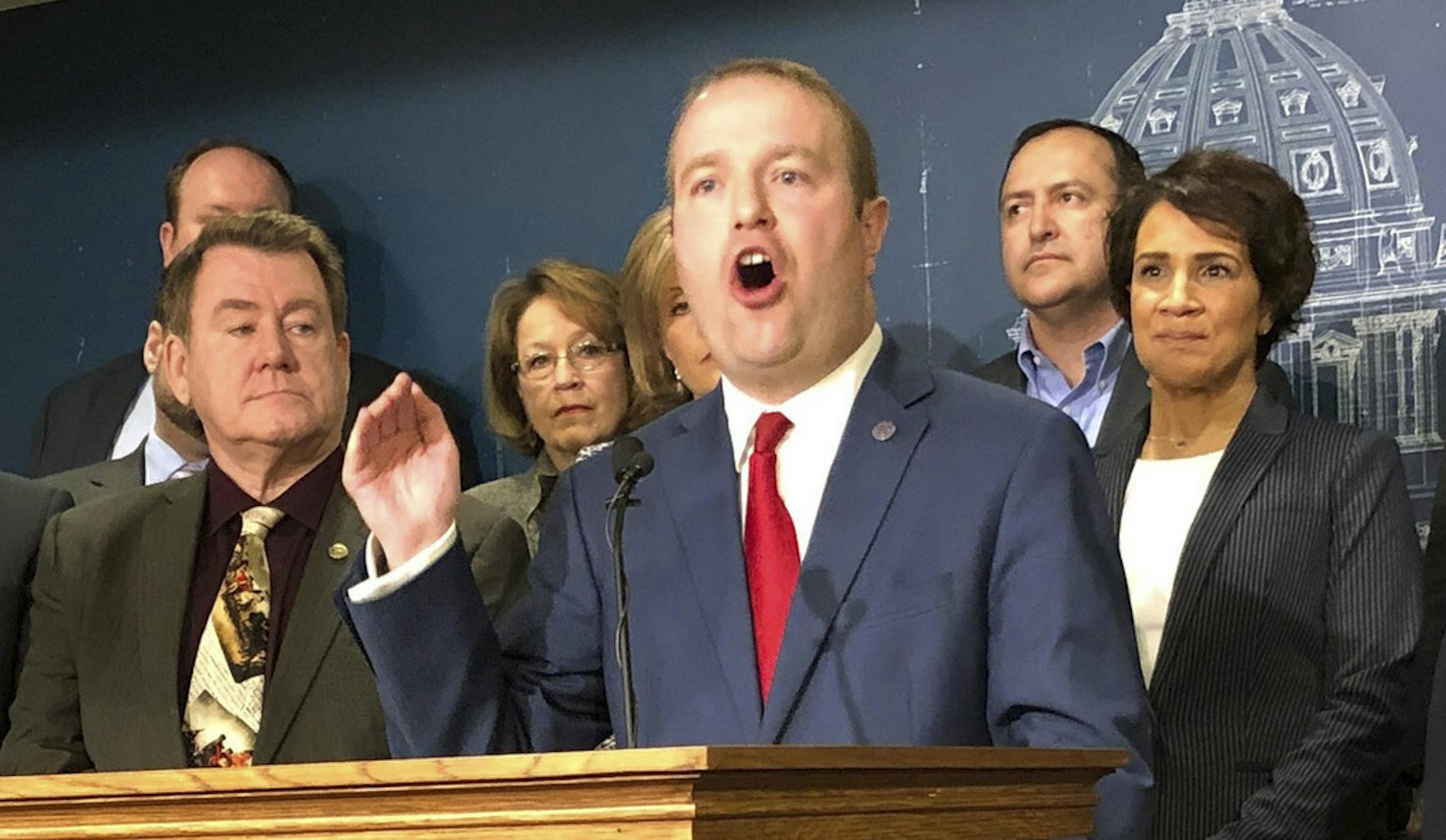 Minnesota State Rep. Nick Zerwas and other Minnesota House Republicans announce a proposal at the state Capitol on Monday, March 25, 2019, that will crackdown on fraud in the state's Child Care Assistance Program. The bill announced Monday comes in response to a recent report by the legislative auditor that found significant fraud within the child care program, which helps low-income parents afford care while they work or attend school. The auditor was unable to put a dollar figure on the fraud.