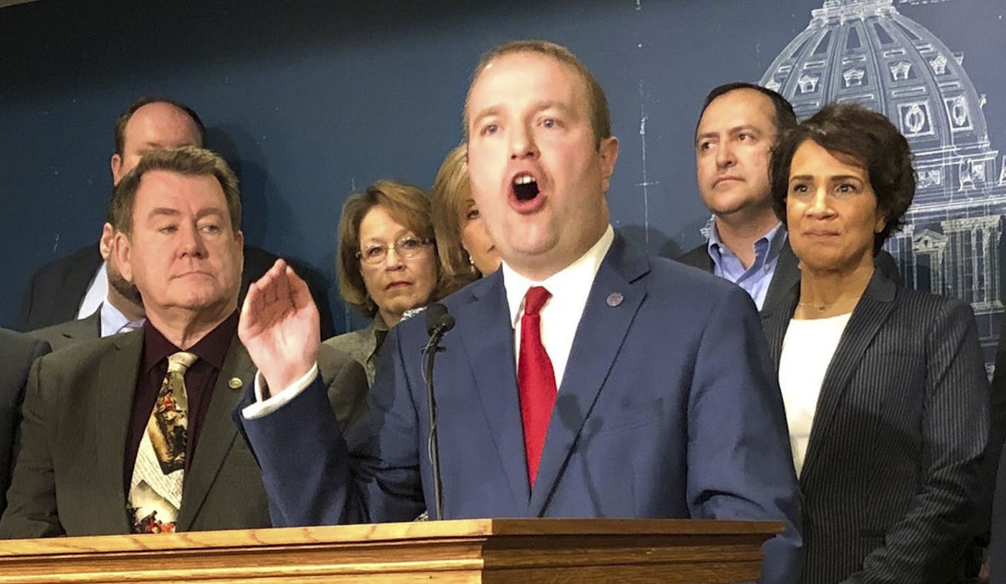 Minnesota State Rep. Nick Zerwas and other Minnesota House Republicans announce a proposal at the state Capitol on Monday, March 25, 2019, that will crackdown on fraud in the state's Child Care Assistance Program. The bill announced Monday comes in response to a recent report by the legislative auditor that found significant fraud within the child care program, which helps low-income parents afford care while they work or attend school. The auditor was unable to put a dollar figure on the fraud.