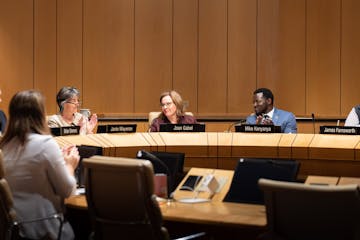 University of Minnesota regents, pictured here at a meeting this summer with former President Joan Gabel, are considering creating a new panel to revi