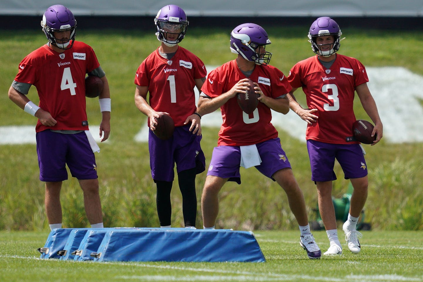 Vikings quarterbacks Sean Mannion (4), Kyle Sloter (1), Kirk Cousins (8), and Jake Browning (3), took part in drills during training camp last year.