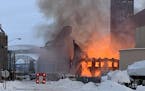 A four-story, 48,000-square-foot warehouse, built in the late 1800s, caught fire Thursday morning in Superior, Wis.