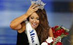 Miss North Dakota Cara Mund reacts after being named Miss America during Miss America 2018 pageant, Sunday, Sept. 10, 2017, in Atlantic City, N.J.