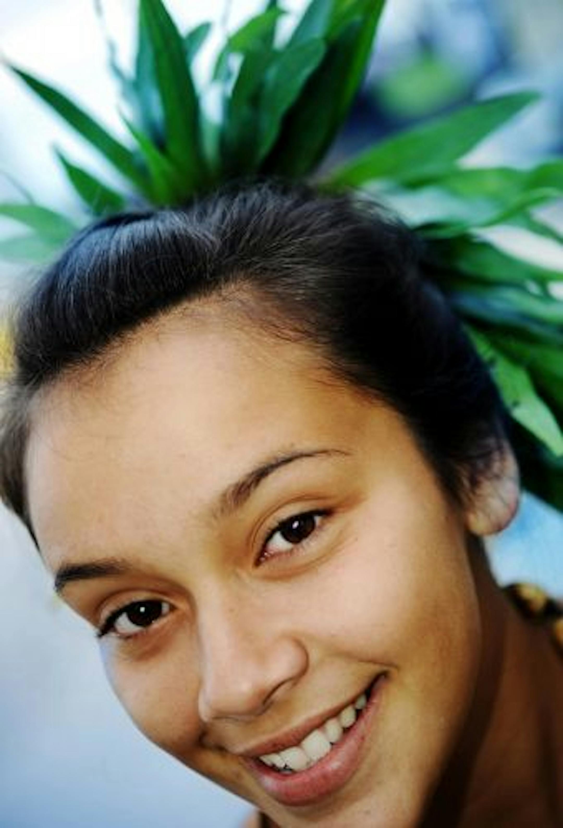 Leolani Russell, 16, performs the hula near the Royal Hawaiian in Waikiki on Oahu Island, Hawaii.