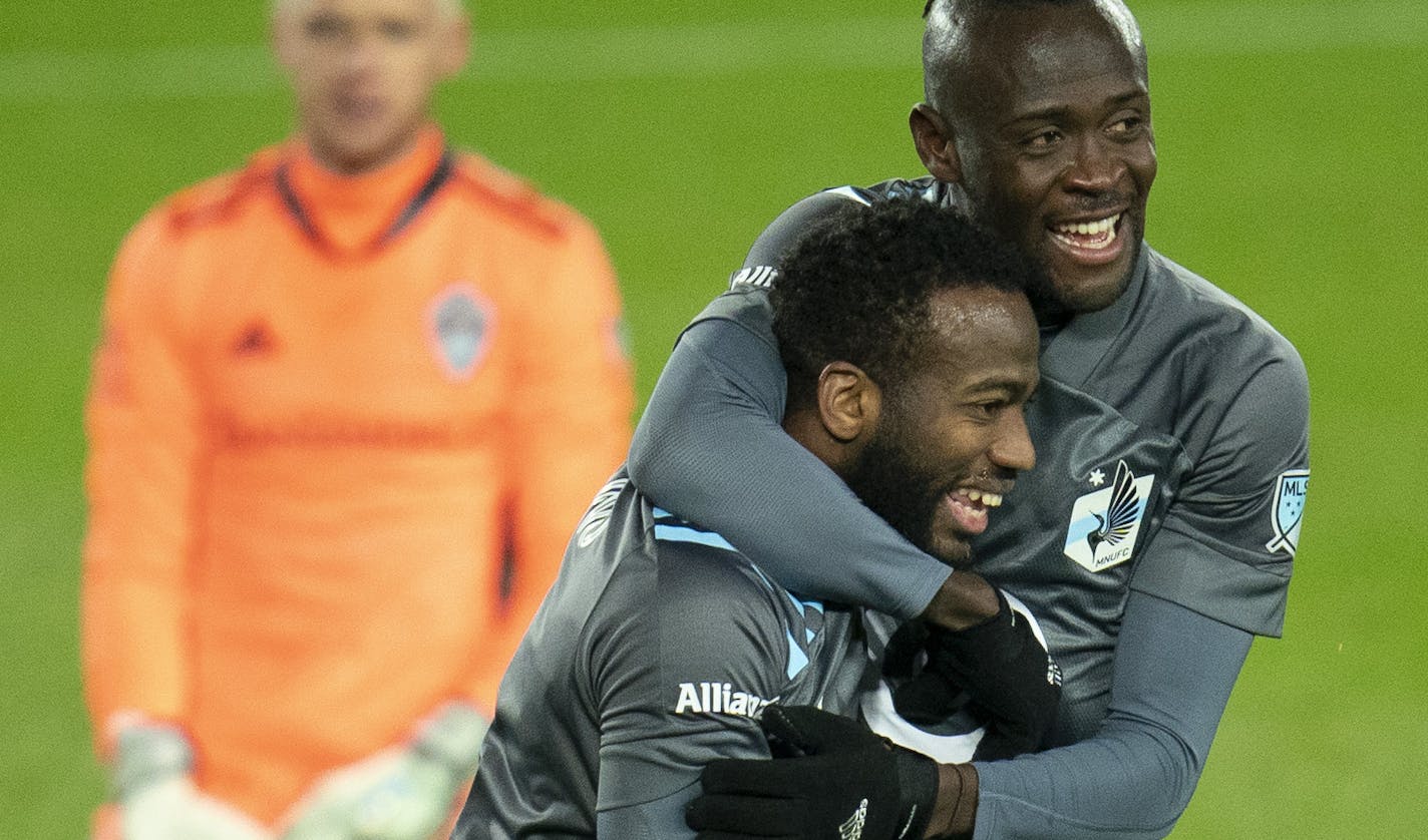 Kei Kamara wrapped Kevin Molino in a hug after Molino's second goal propelled the Loons toward a playoff victory Sunday.