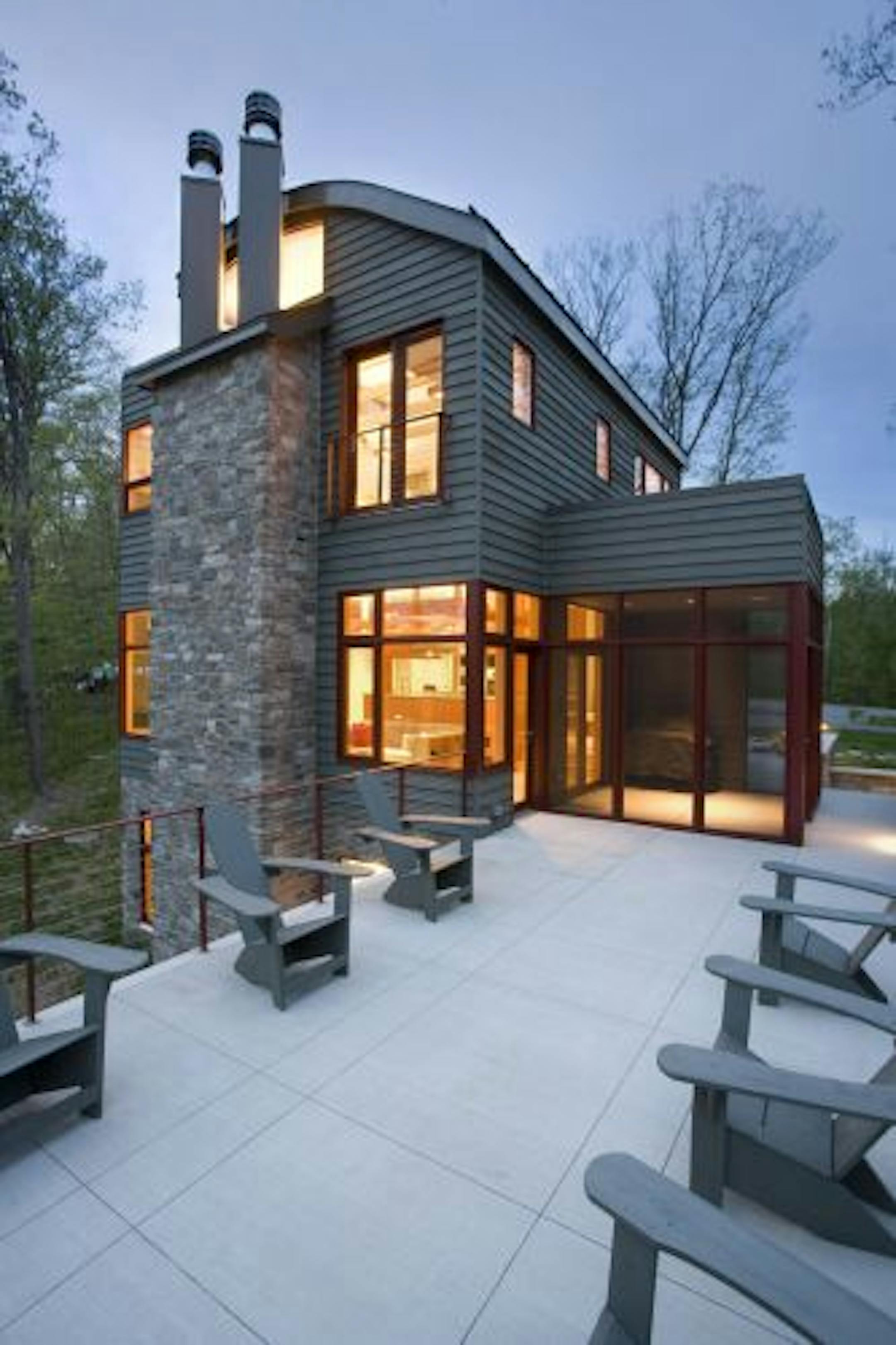 The deck and exterior of a lake home at in Cumberland, Wis. designed by SALA.
