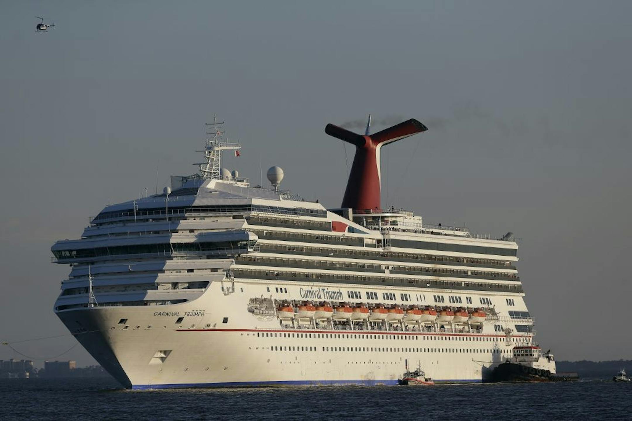 Feb. 14, 2013: The cruise ship Carnival Triumph is towed into Mobile Bay near Dauphin Island, Ala.