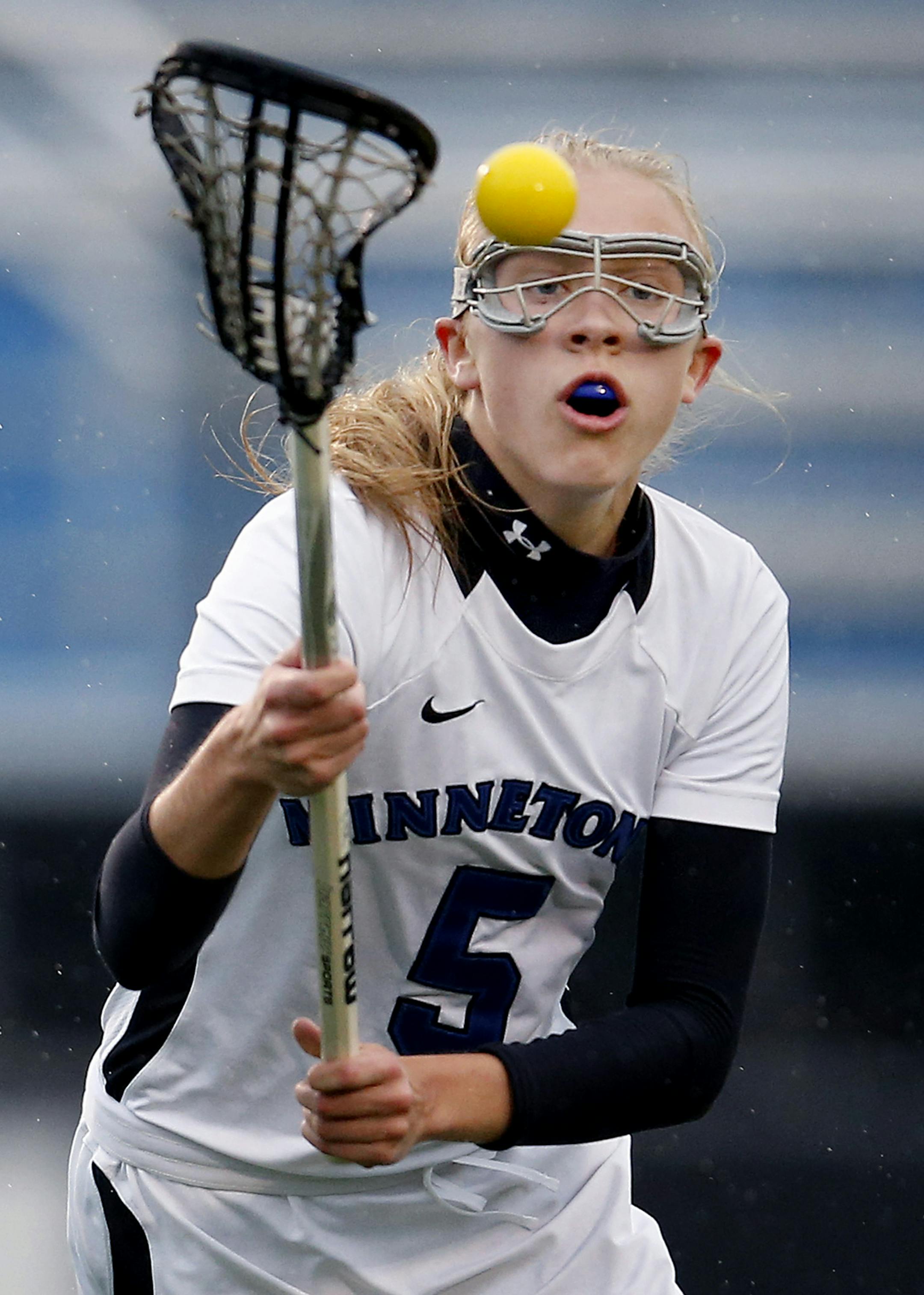 Erin McGinnis (5) of Minnetonka kept her eye on the ball during the first half vs. Wayzata. ] CARLOS GONZALEZ cgonzalez@startribune.com, May 14, 2015, Minnetonka, MN, Minnetonka vs. Wayzata in Girlís High / Prep School Lacrosse,