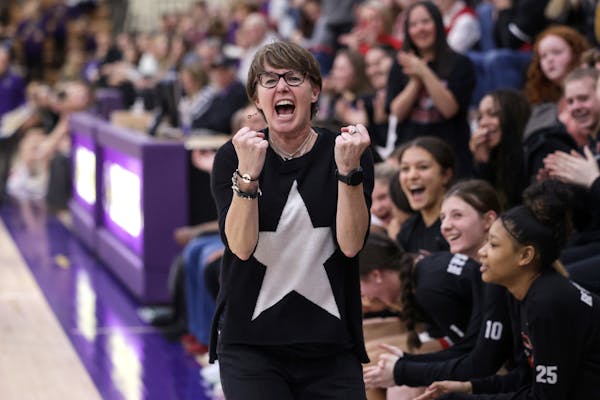 Eden Prairie head coach Ellen Wiese turns her attention to the student section in the final minute of the game. Photo by Cheryl A. Myers, SportsEngine