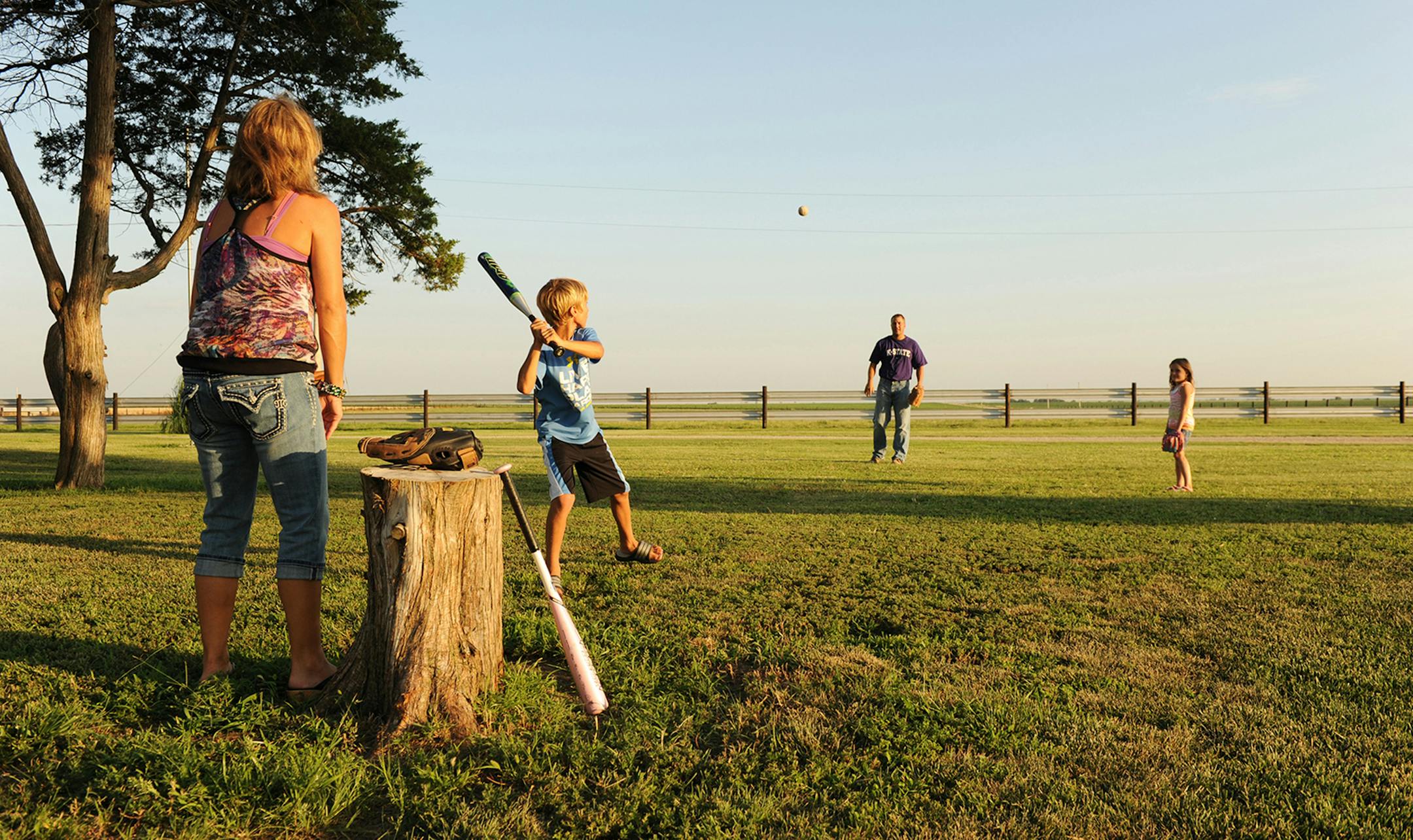 Farm-fresh baseball: David Lundquist took this photo of a Kansas farm family as a communications employee at CHS in Inver Grove Heights. [focus052817