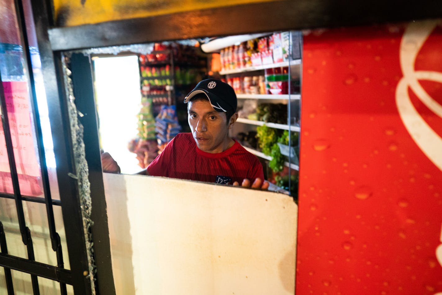 Friends and relatives tried to secure La Poblanita in Minneapolis after it was looted Wednesday night.