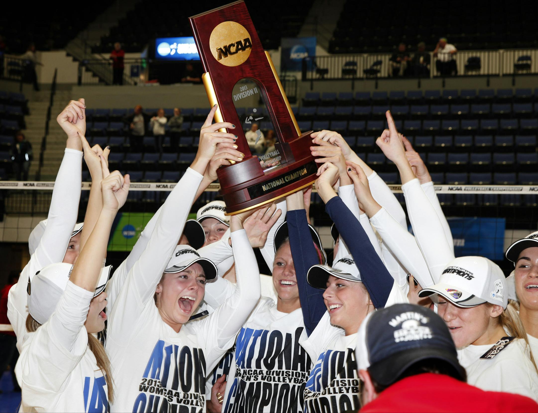 14 DEC 2013 Concordia-St. Paul celebrates their win during the Division II Women's Volleyball Championship game held at the U.S. Cellular Center in Cedar Rapids, IA for the 7th time in a row. . Concordia-St. Paul won over BYU-Hawaii in 3 straight sets. Conrad Schmidt/NCAA Photos