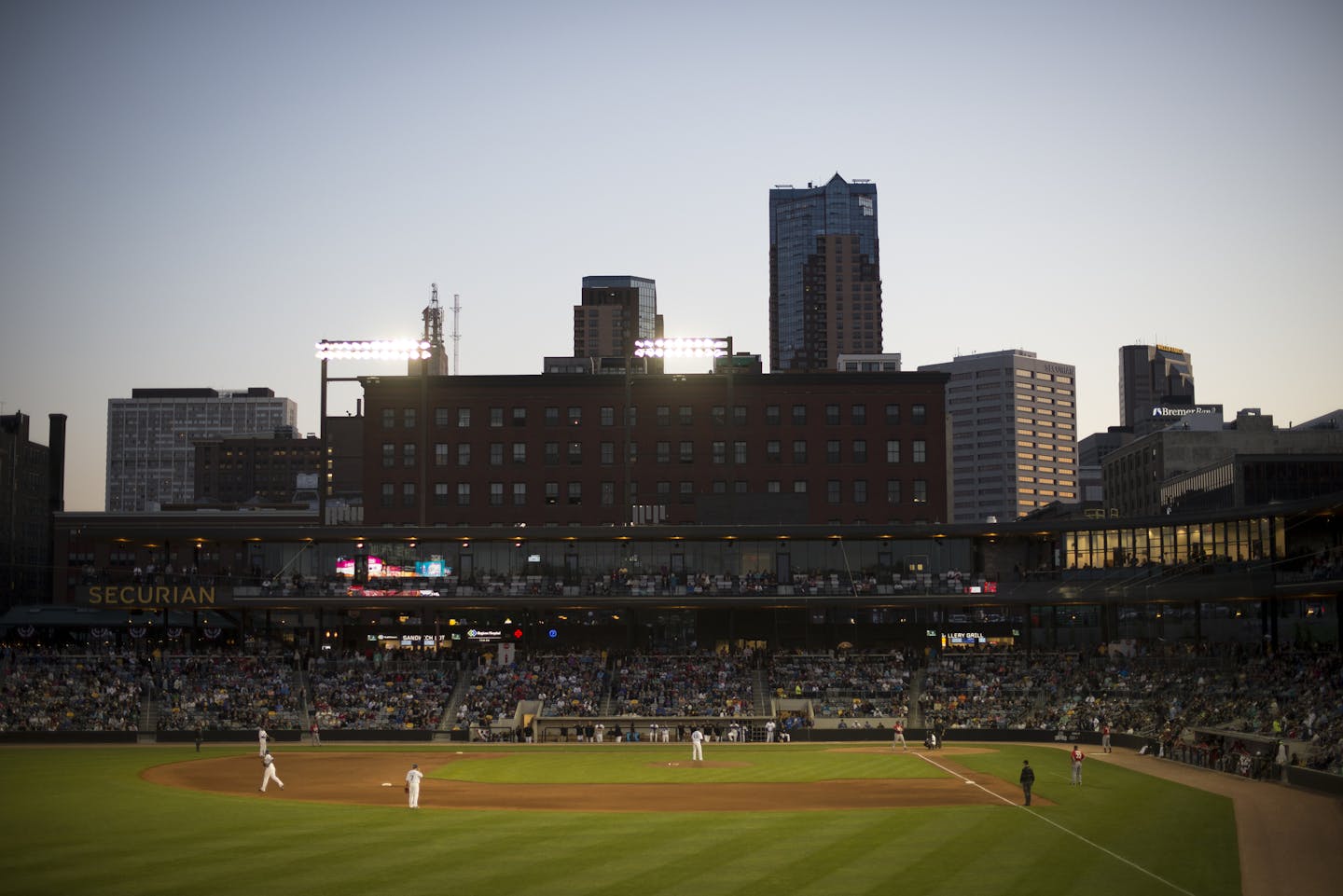 The St. Paul skyline is visible from beyond CHS Field on Thursday night. ] Aaron Lavinsky ¥ aaron.lavinsky@startribune.com The St. Paul Saints hold their season opener against the Fargo-Moorhead Redhawks at brand-new CHS Field on Thursday, May 21, 2015. ORG XMIT: MIN1505212122051820