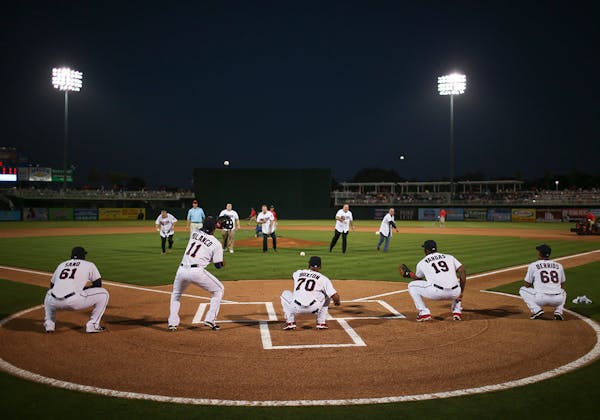 There were five more or less simultaneous first pitches thrown before the game Thursday evening at Hammond Stadium.