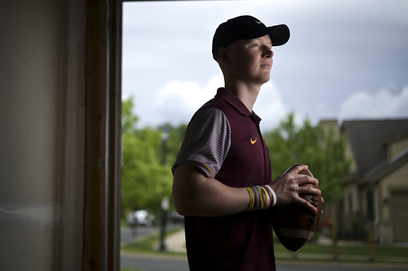 Casey O'Brien stood for a portrait at his Mendota Heights home Tuesday. ] aaron.lavinsky@startribune.com Gophers holder Casey O'Brien was photographed Tuesday, May 26, 2020 at his home in Mendota Heights, Minn.