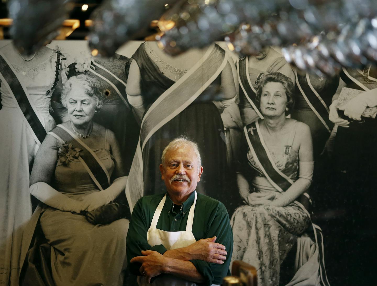 Erich Christ owner of the Black Forest posed for a portrait standing front of photograph by Richard Avedon Thursday Monday April 23, 2015.The Black Forest Inn celebrates 50 years on May 15, an anchor in a neighborhood that has evolved over the years, and a business still run by family. ] Jerry Holt/ Jerry.Holt@Startribune.com