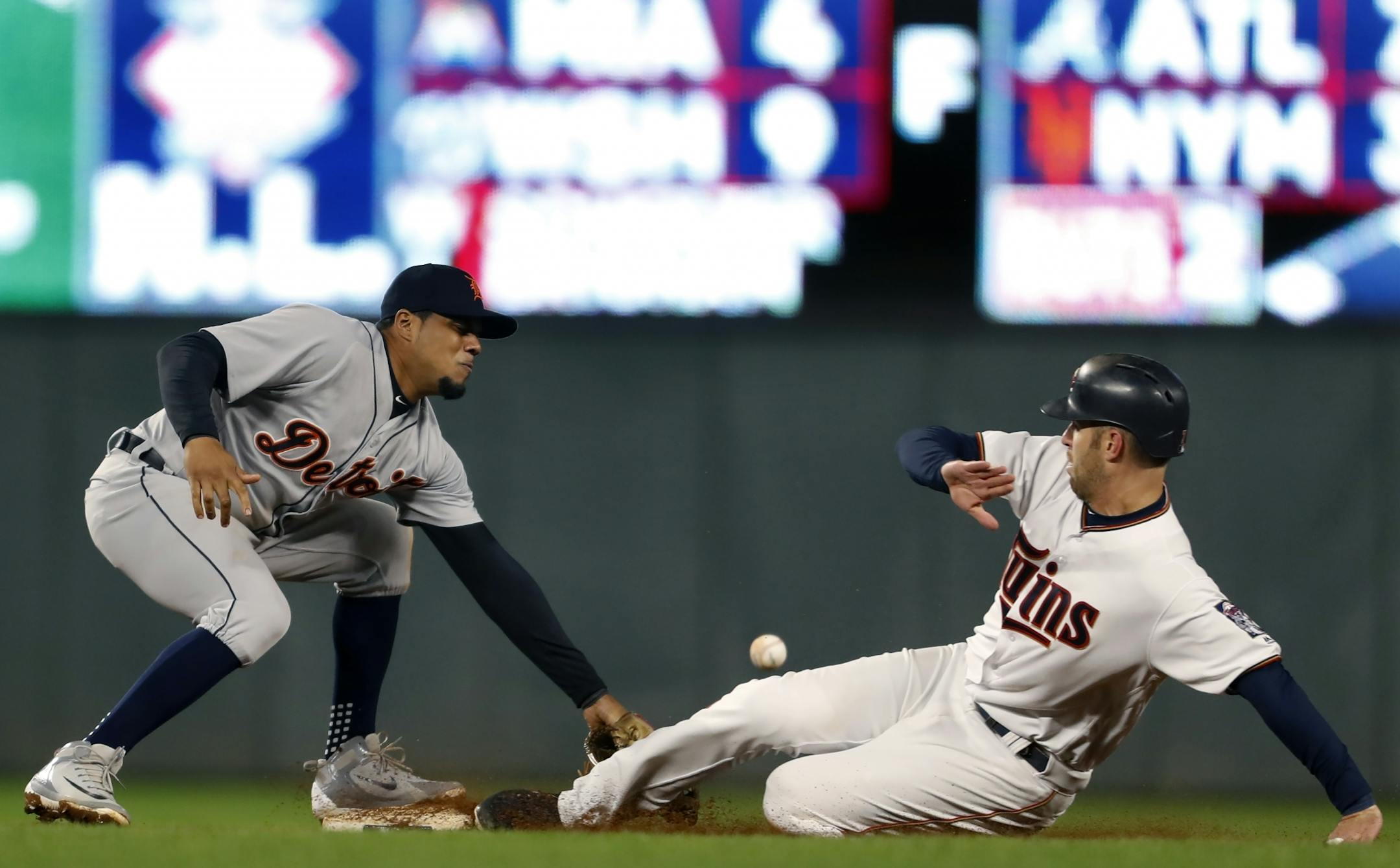 Joe Mauer takes 2nd base then third base on a throwing error by catcher Joe McCann to infielder Jaime Candelario.