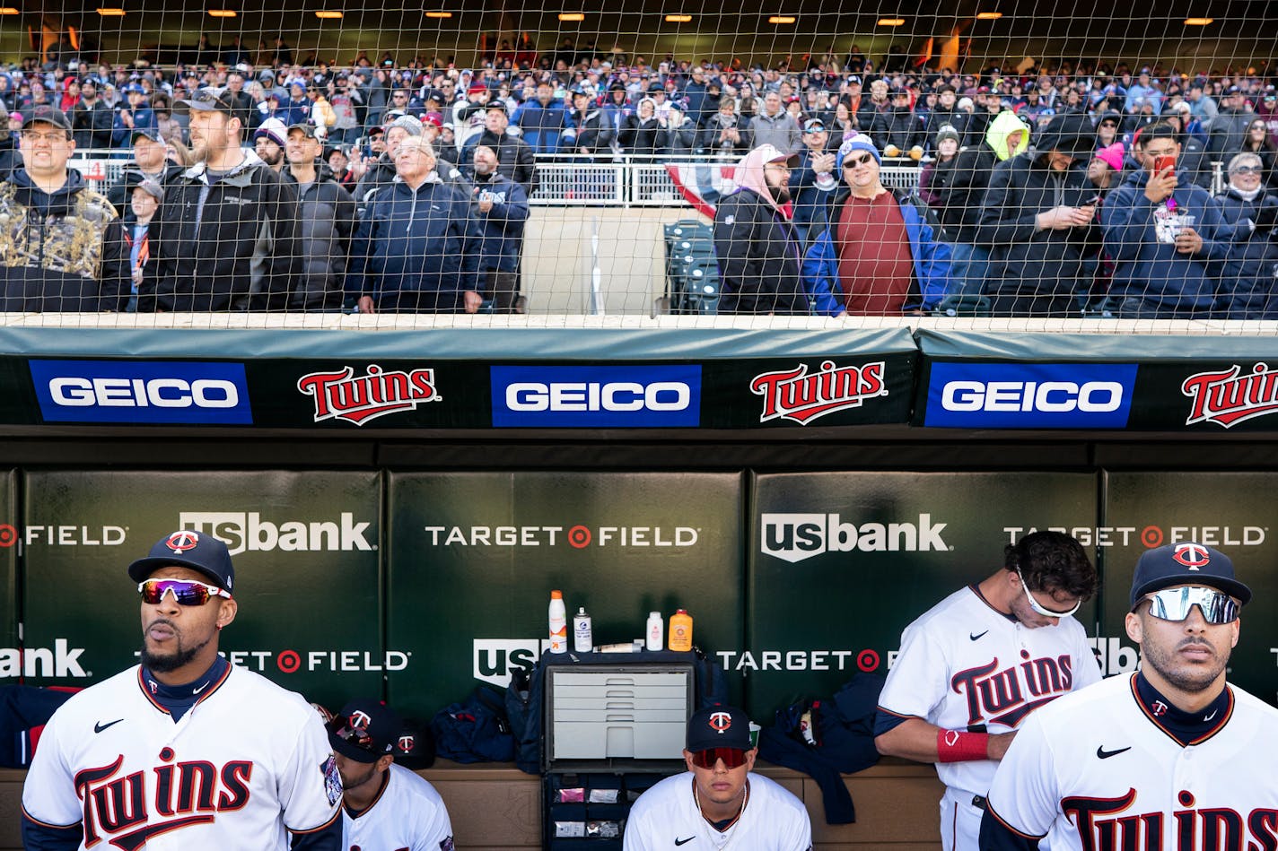 Minnesota Twins center fielder Byron Buxton , (25) left and shortstop Carlos Correa ,(4) stood in the dugout at Target Field during pregame in Minneapolis, Minn., on Friday, April 8, 2022.