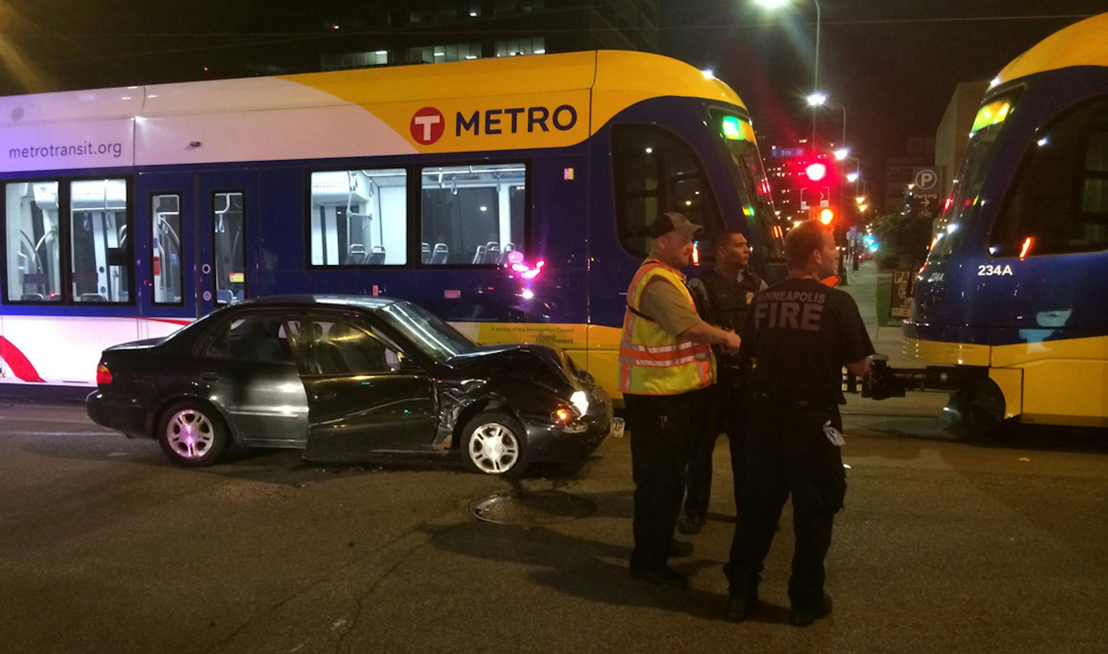 A car and Green Line light-rail train collided outside the Star Tribune building in downtown Minneapolis on June 8, 2014.
