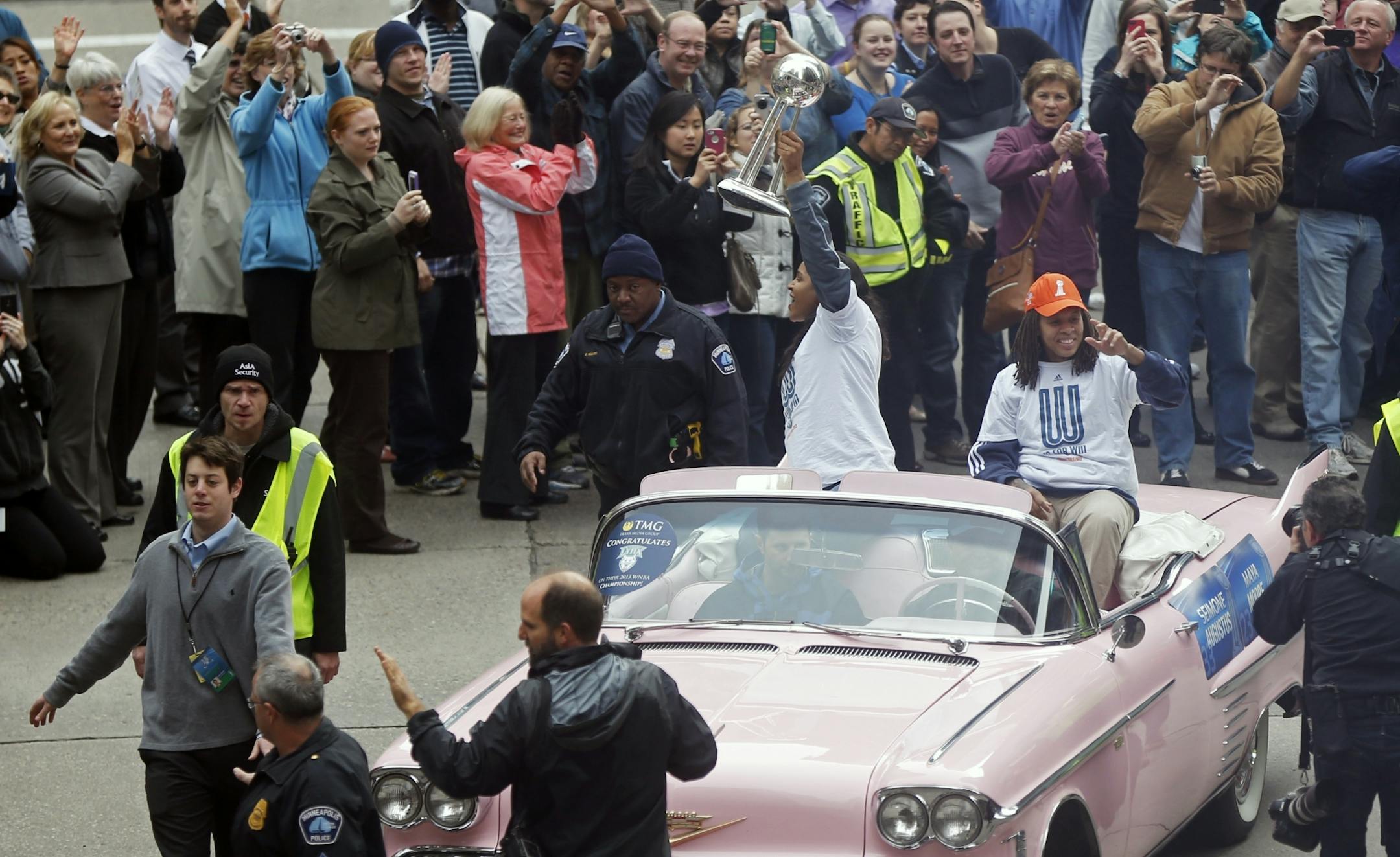 On Nicollet Mall in downtown Minneapolis, the Minnesota Lynx Maya Moore,left, and Seimone Augustus, right, celebrated their 2013 WNBA Championship on a parade route to Target Center.
