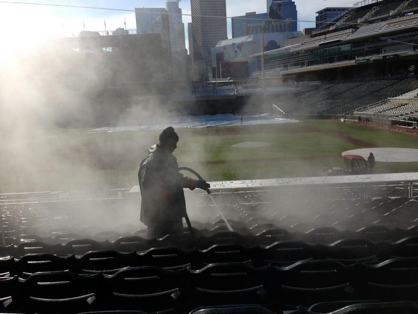 Minnesota Twins grounds crew worked through the night and continued early Tuesday to prep Target Field for a chilly afternoon and evening of baseball.