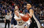 Champlin Park's Josiah Strong, right, tipped the ball away from Chaska's Parker Bjorklund during Class 4A quarterfinal action last March at Target Cen