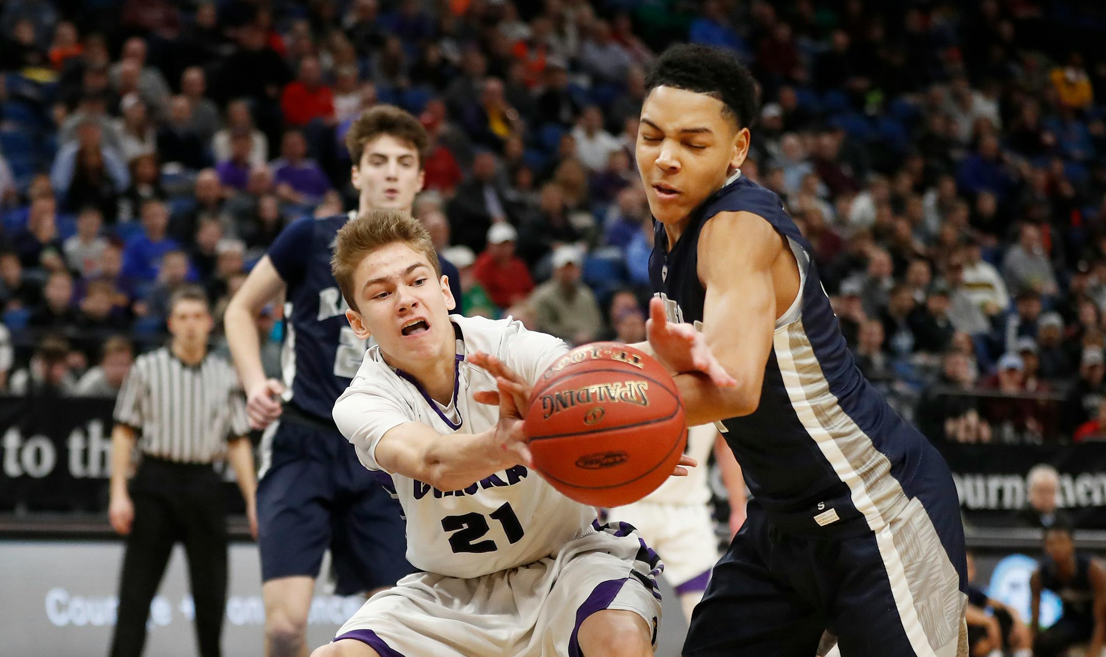 Champlin Park's Josiah Strong, right, tipped the ball away from Chaska's Parker Bjorklund during Class 4A quarterfinal action last March at Target Center.