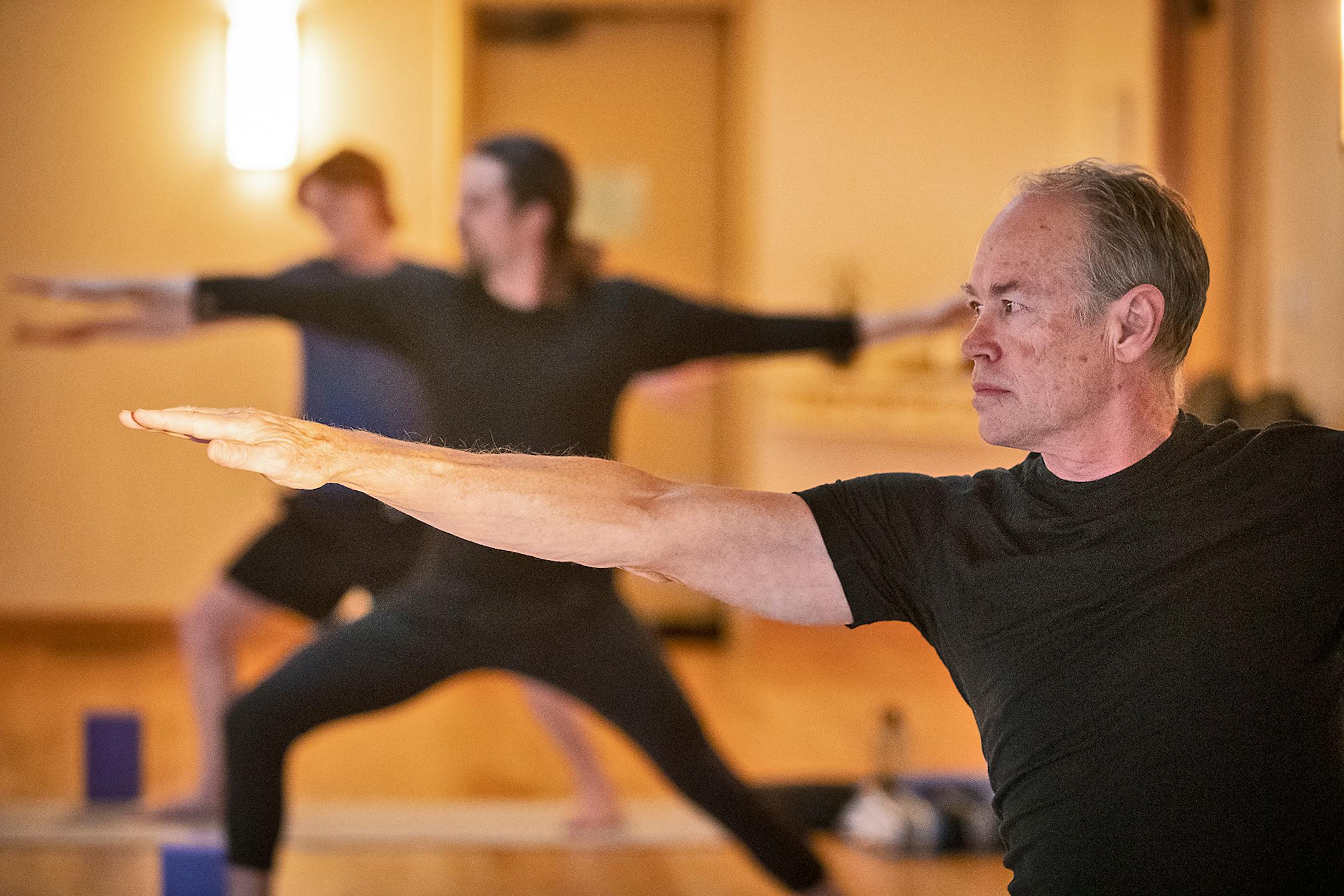 Greg Pratt attends Mindful Yoga class.
