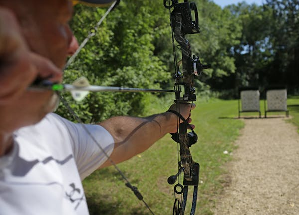 In this file photo, a bow hunter practices at the South St. Paul archery range.