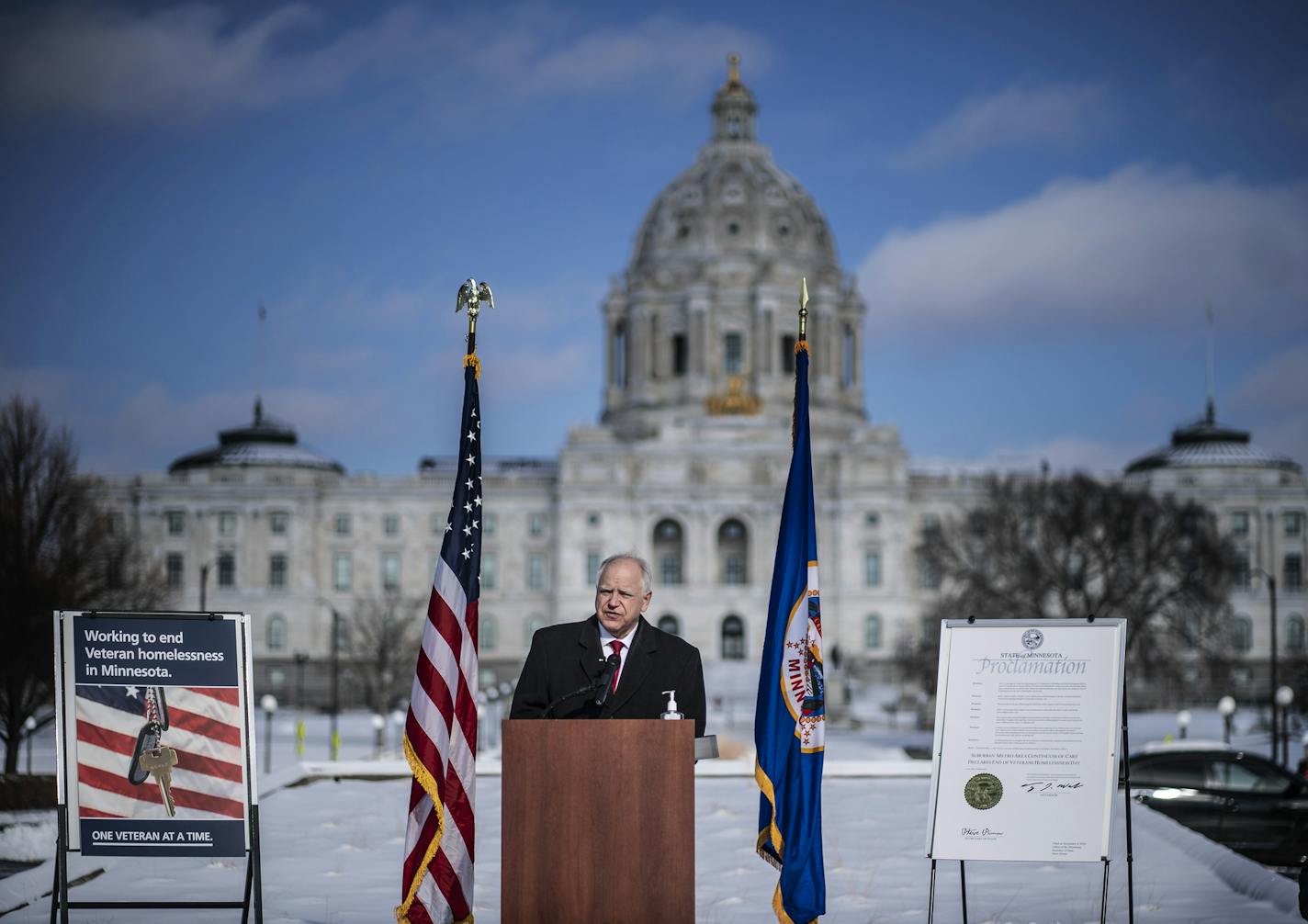 Gov. Tim Walz spoke Wednesday near the World War II Memorial about the problem of homelessness for veterans in Minnesota.