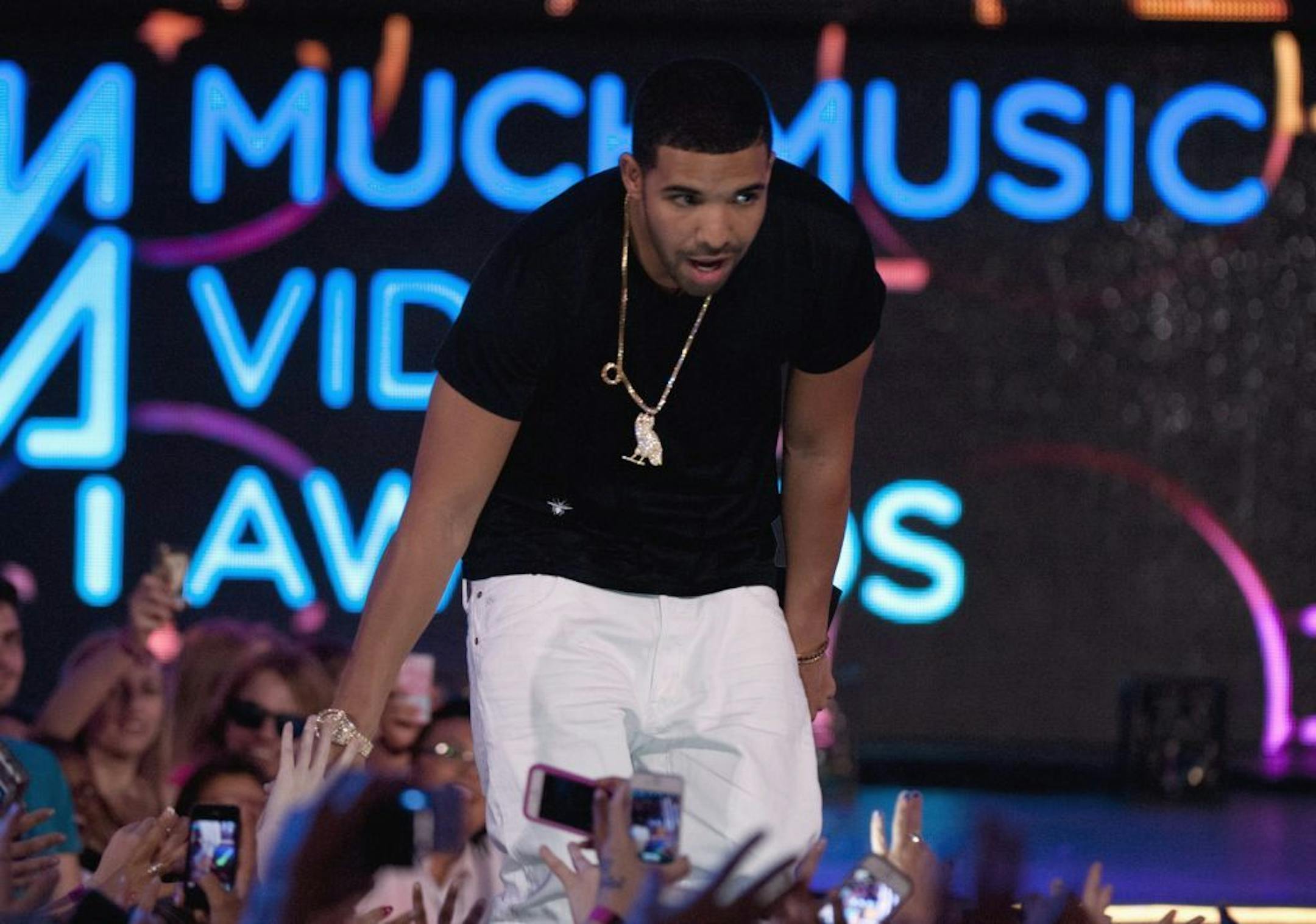 Drake greets fans during the 2013 Much Music Video Awards in Toronto on Sunday June 16, 2013.