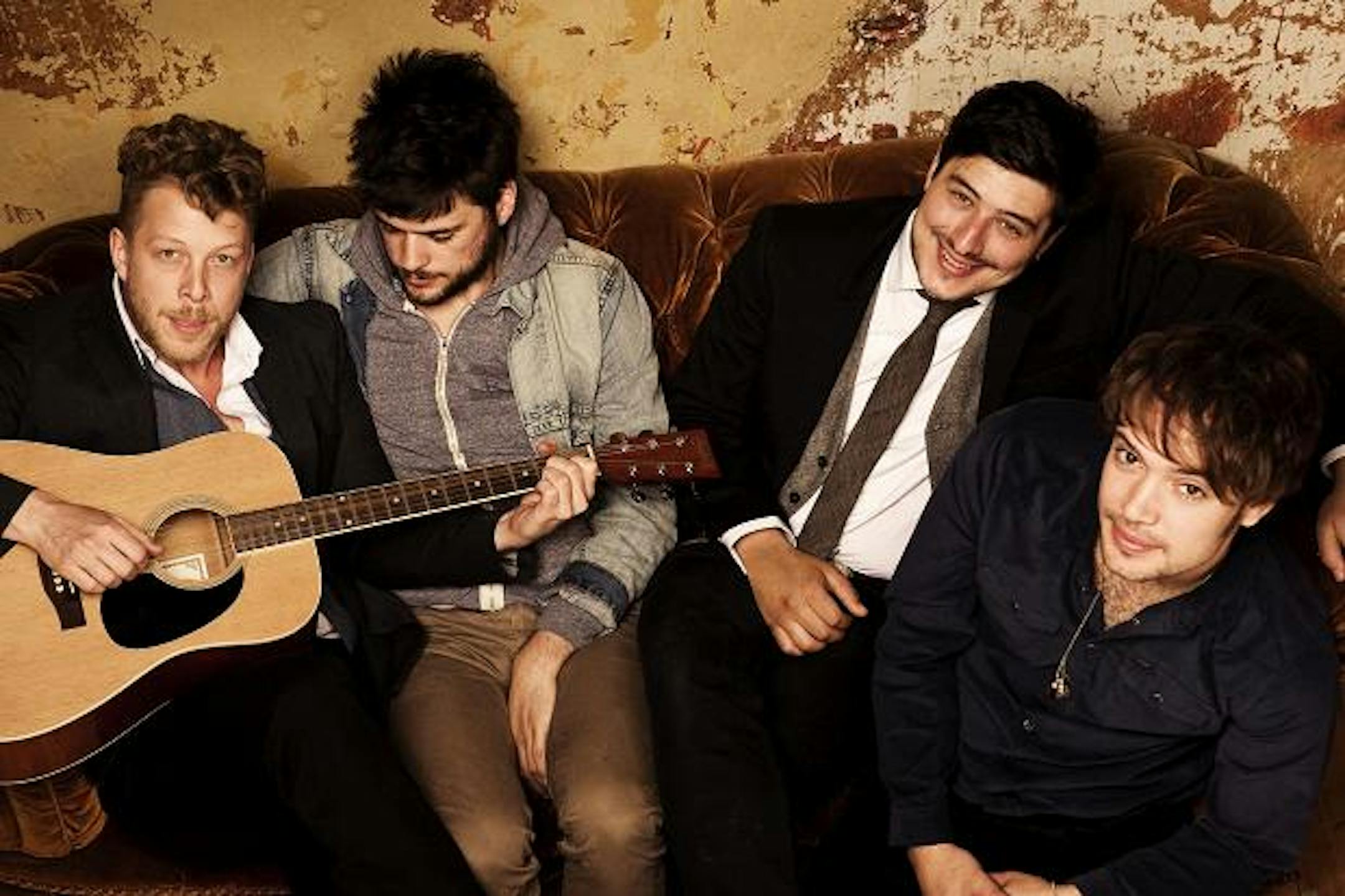 When he's not going out on dates with actress Carey Mulligan, British folk-rocker Marcus Mumford (second from right) tours with his namesake band.