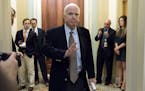 FILE - In this June 22, 2017, file photo Sen. John McCain, R-Ariz., arrives for a Senate Republican meeting on a health reform bill on Capitol Hill in