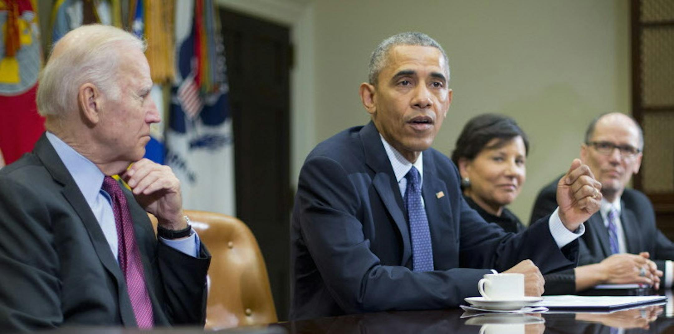 President Barack Obama speaks during a meeting with members of his economic team in the Roosevelt Room of the White House in Washington, Friday, March 4, 2016. Obama spoke about U.S. employers adding 242,000 workers in February, driving another solid month for the resilient American job market. From left are, Vice President Joe Biden, the president, Commerce Secretary Penny Pritzker, and Labor Secretary Thomas E. Perez. (AP Photo/Pablo Martinez Monsivais)