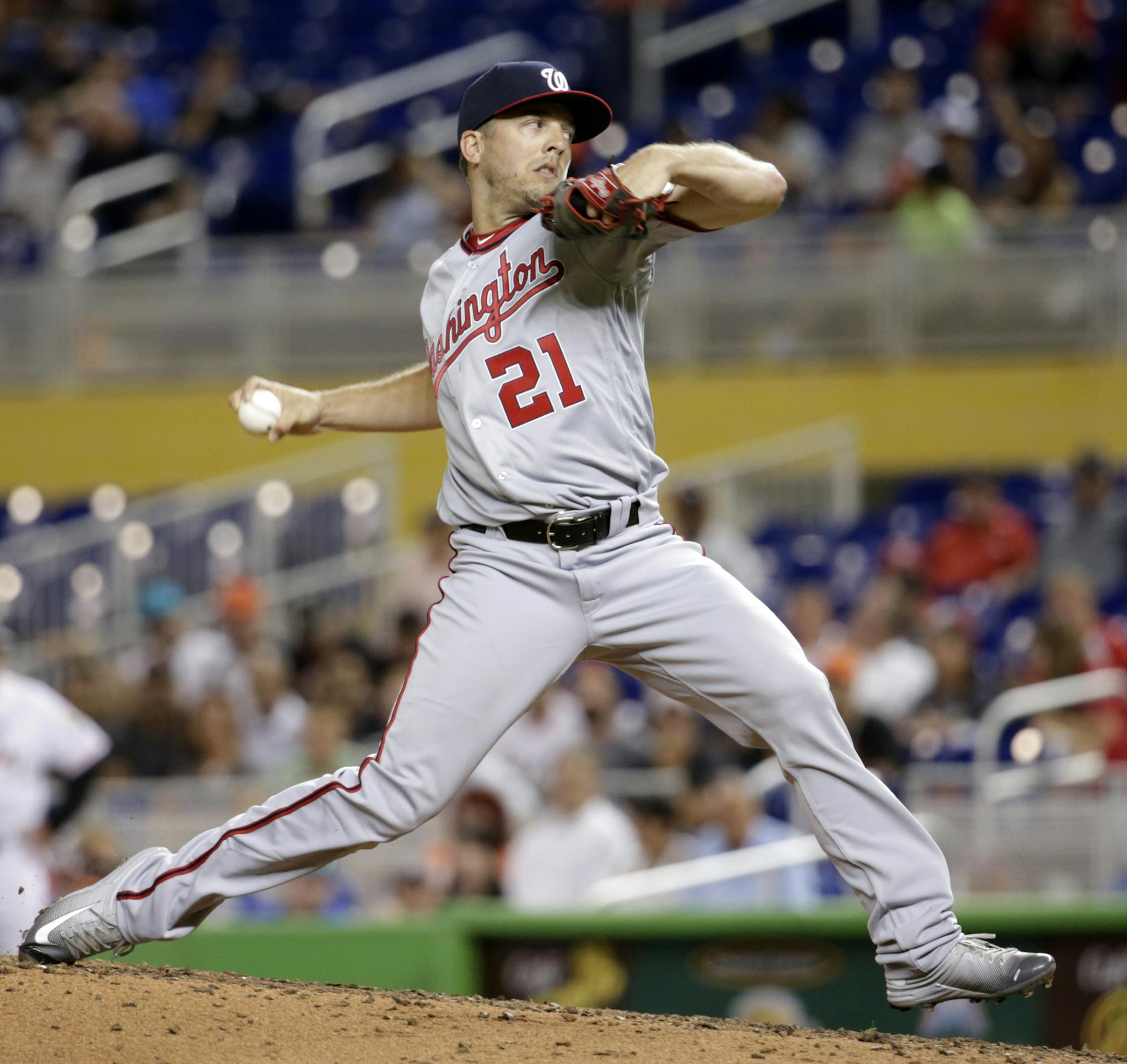 Washington Nationals relief pitcher Brandon Kintzler delivers during the eighth inning of the team's baseball game against the Miami Marlins, Wednesday, Aug. 2, 2017, in Miami. The Marlins won 7-0. (AP Photo/Lynne Sladky)