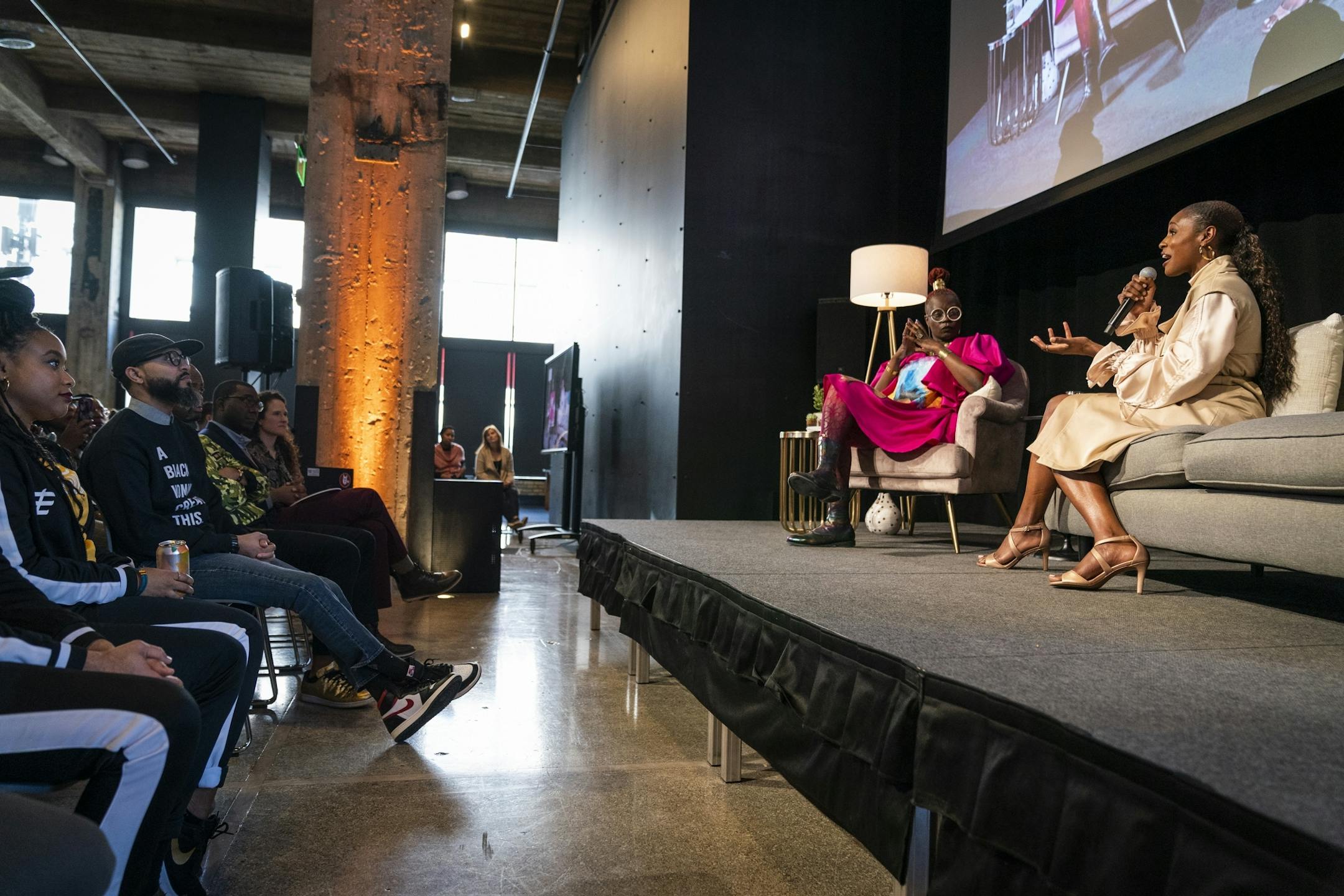Writer and comedian Issa Rae, right, spoke with Caroline Wanga, Target's chief culture, diversity and inclusion officer, during an event at Target headquarters.