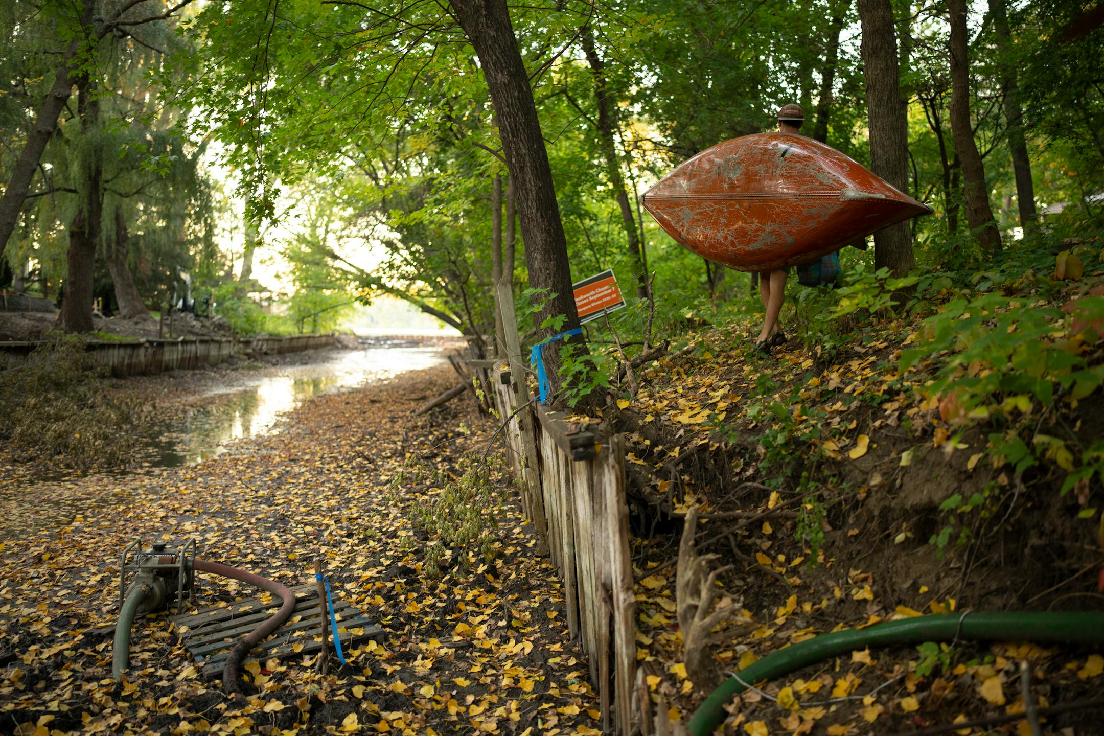 Mitchell Erickson was undeterred by the lack of water in the Kenilworth Channel and simply portaged his canoe the 700 feet between the Burnham Rd. bridge and Cedar Lake.