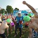 Young triathletes limbered up before the start of the race at Lake Elmo Park Reserve as Bob Powers looked on. At 91, Powers is the nation�s oldest t