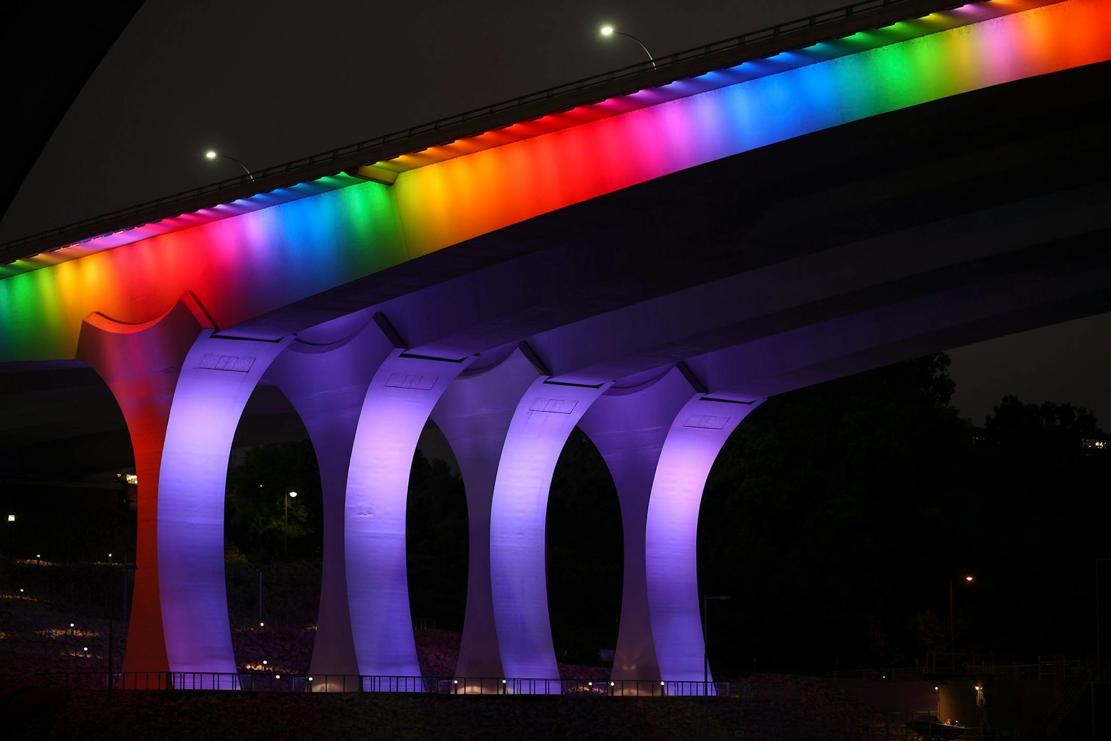 The I-35W bridge was lit in rainbow of colors to honor the victims of the massacre at the Pulse nightclub in Orlando, Florida, in June 2016.