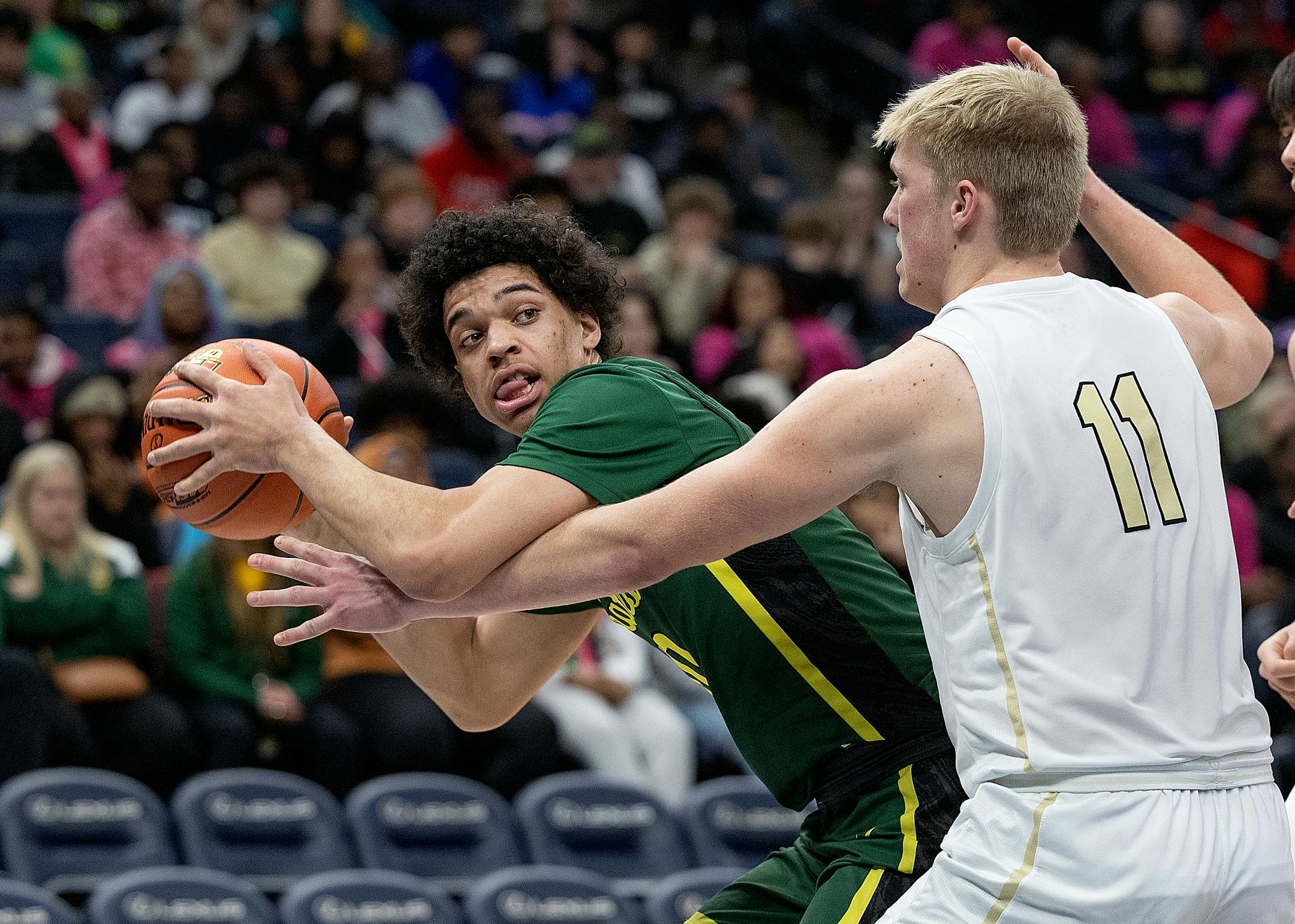 Park Center's Jackson Fowlkes and Andover's Tate Johnson battle for the ball under the net during the first half of their game in the Class 4A basketball state tournament at Target Center in Minneapolis, Minn., on Tuesday, March 21, 2023. ] Elizabeth Flores • liz.flores@startribune.com