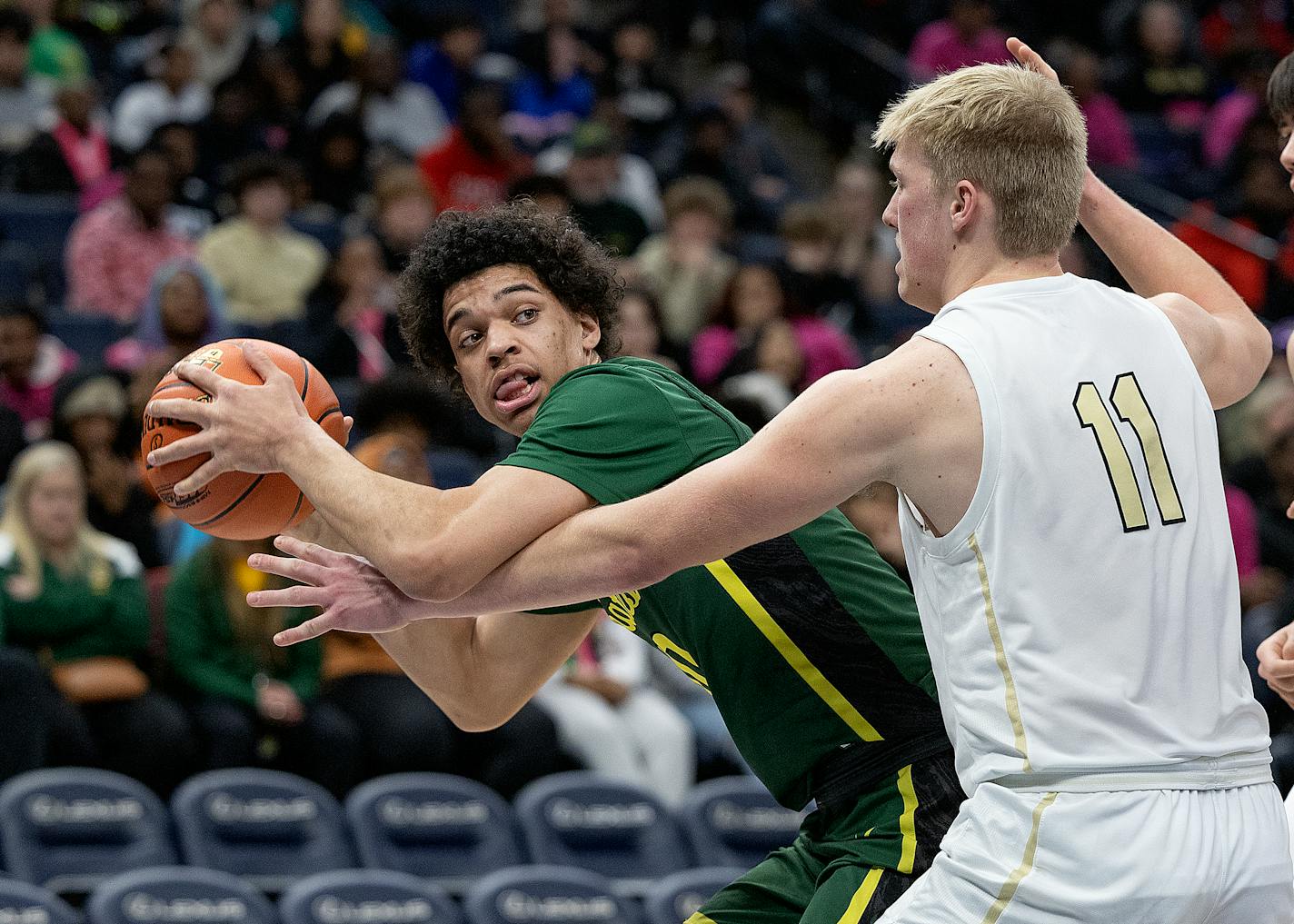 Park Center's Jackson Fowlkes and Andover's Tate Johnson battle for the ball under the net during the first half of their game in the Class 4A basketball state tournament at Target Center in Minneapolis, Minn., on Tuesday, March 21, 2023. ] Elizabeth Flores • liz.flores@startribune.com