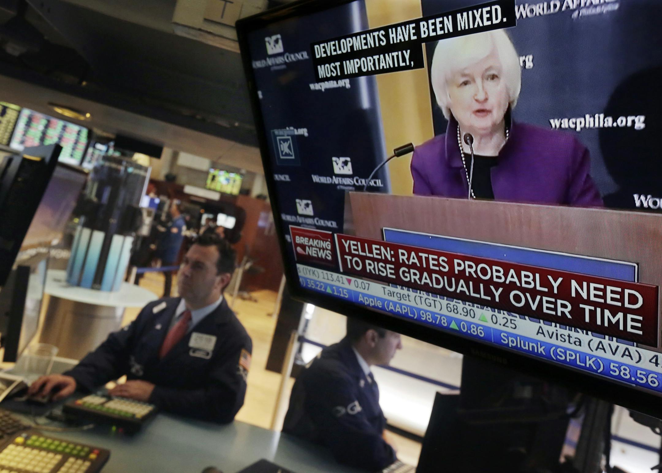 Federal Reserve Chair Janet Yellen's speech in Philadelphia is broadcast on the floor of the New York Stock Exchange, Monday, June 6, 2016. Yellen is signaling her belief that the U.S. economy is improving but remains defined by so many uncertainties that it's unclear when the Fed should resume raising interest rates. (AP Photo/Richard Drew)